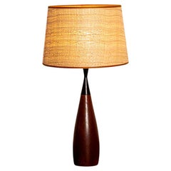 Large Danish keel-shaped table lamp in teak and ebony by Fog & Morup 1960.