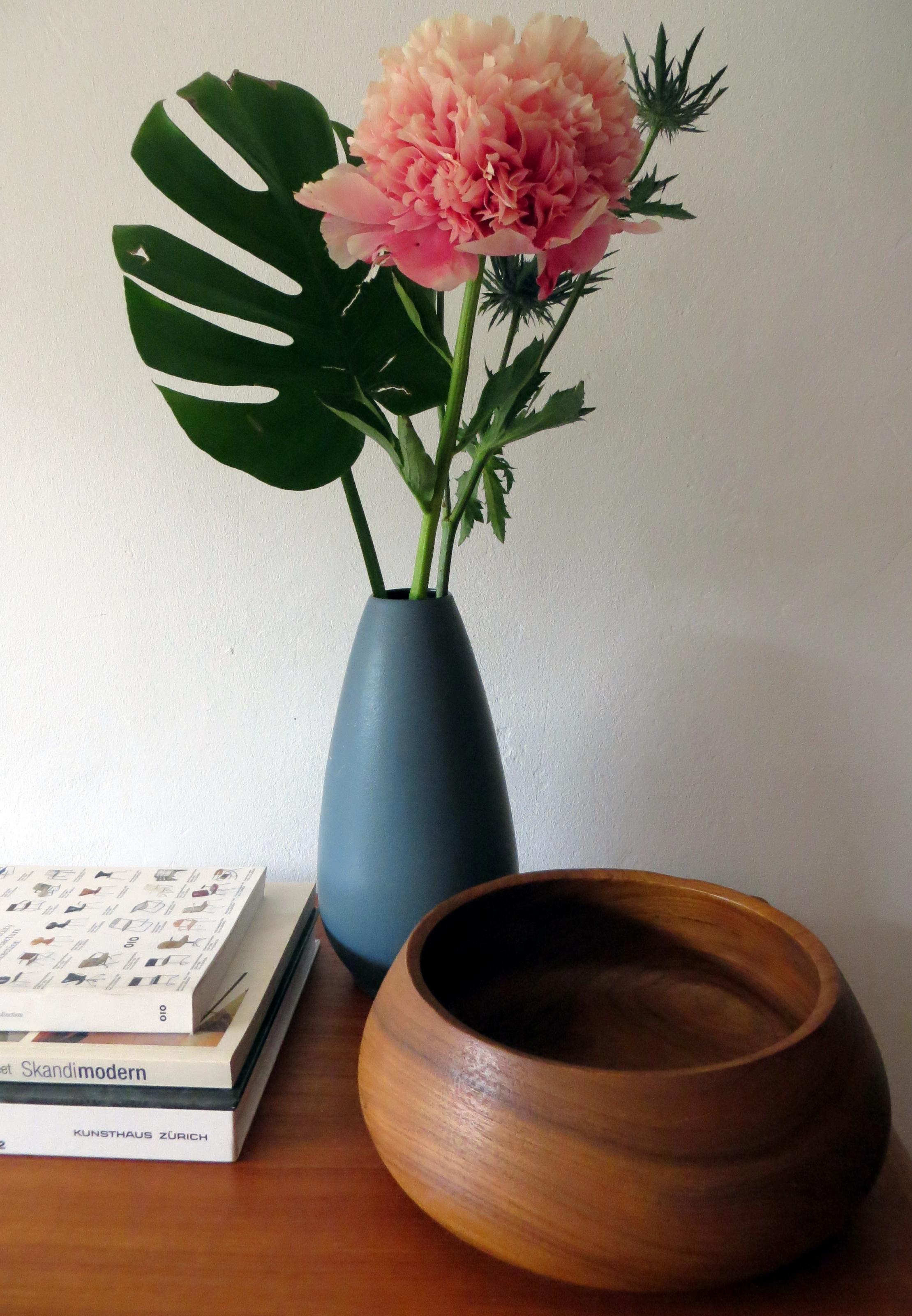 A practical, decorative and sculptural vintage object from Denmark the 1950s, classic Danish Scandinavian modern design in handcrafted first class quality (massive teakwood), can be purchased here.

This dish or bowl is in more than good and