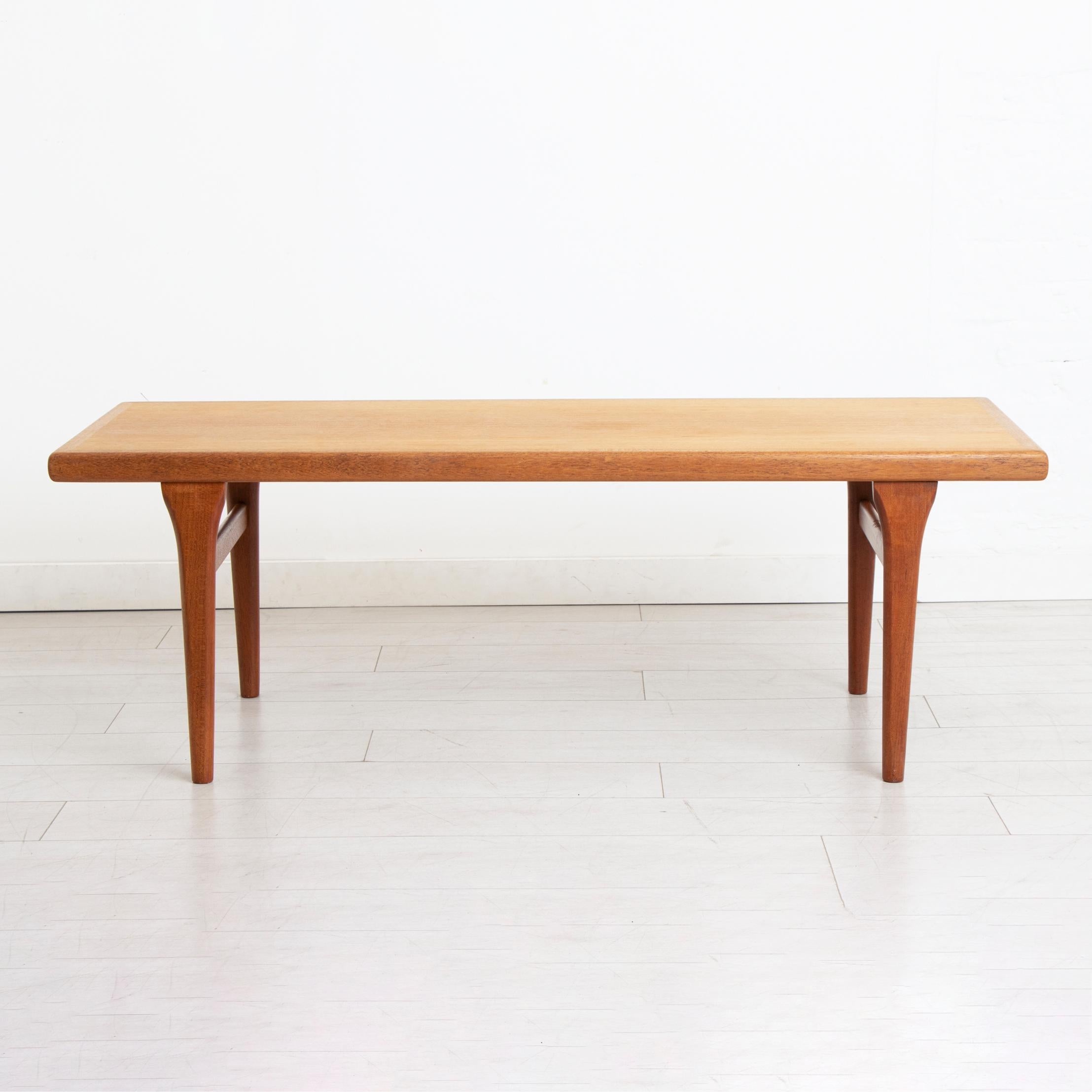 A large Danish mid-century teak coffee table originally purchased from Heals, London in 1965. Excellent restored condition.