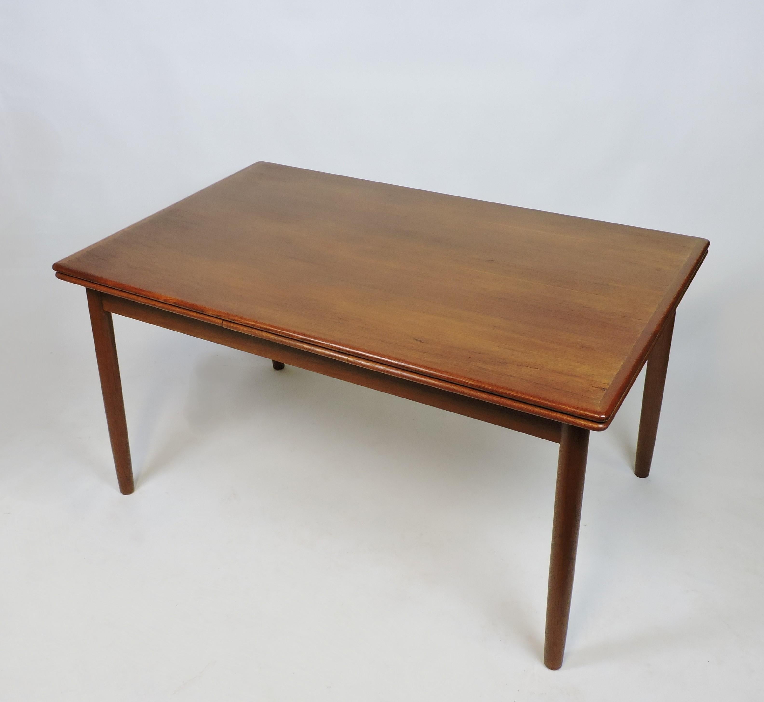 Large Danish Modern Teak Extendable Dining Table with Self-Storing Leaves 5