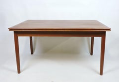 Large Danish Modern Teak Extendable Dining Table with Self-Storing Leaves