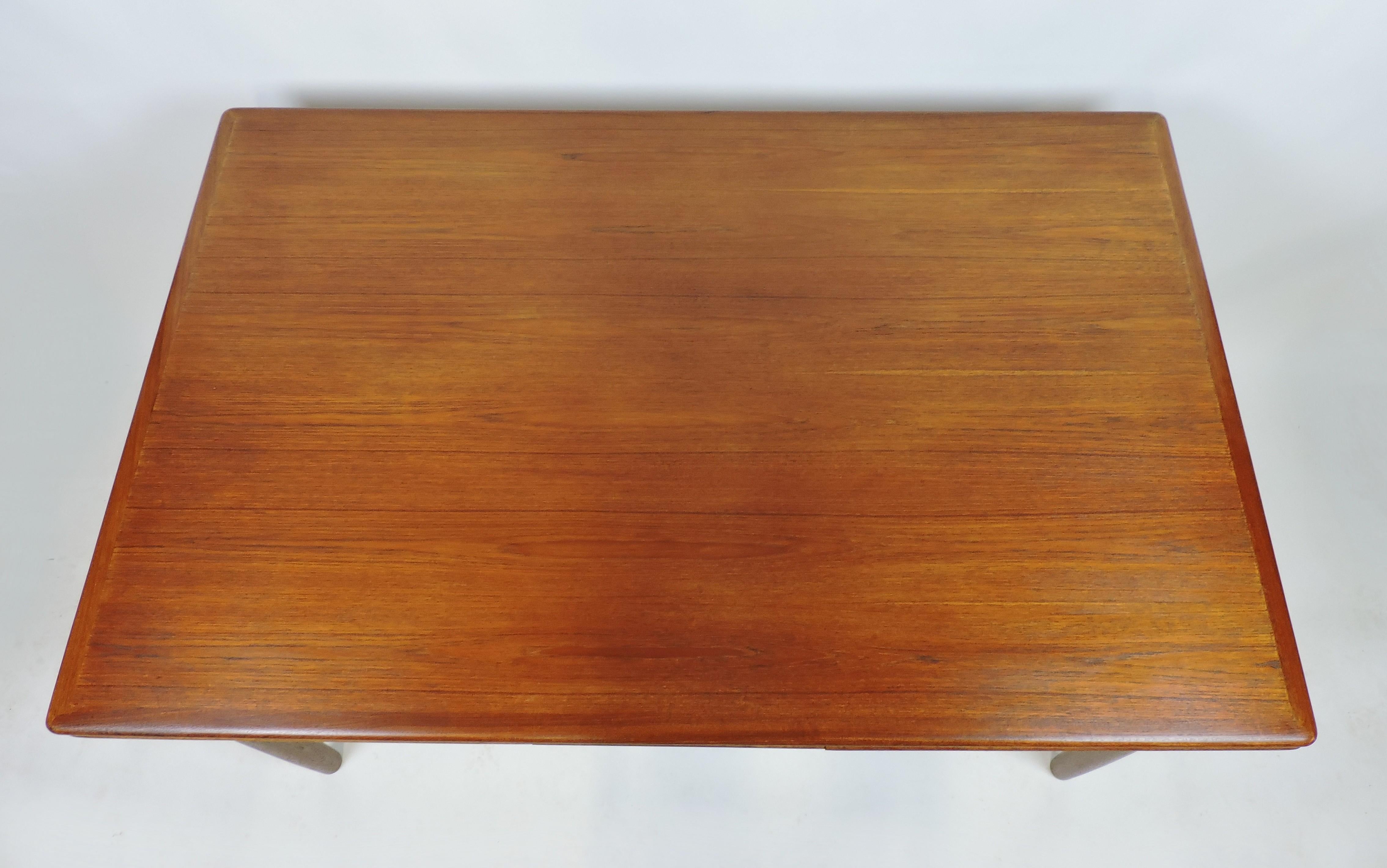 teak dining table extendable