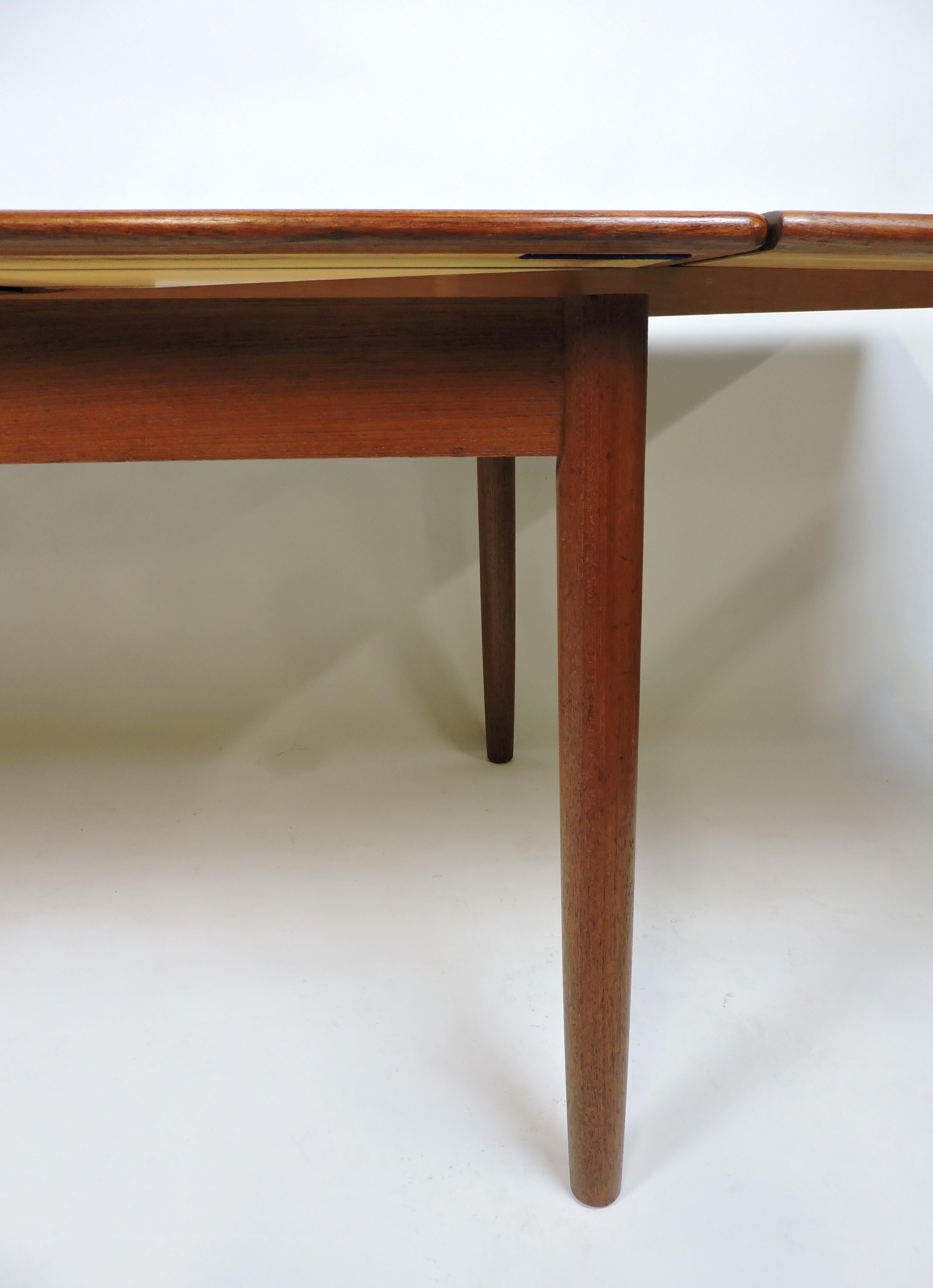 Large Danish Modern Teak Extendable Dining Table with Self-Storing Leaves 1