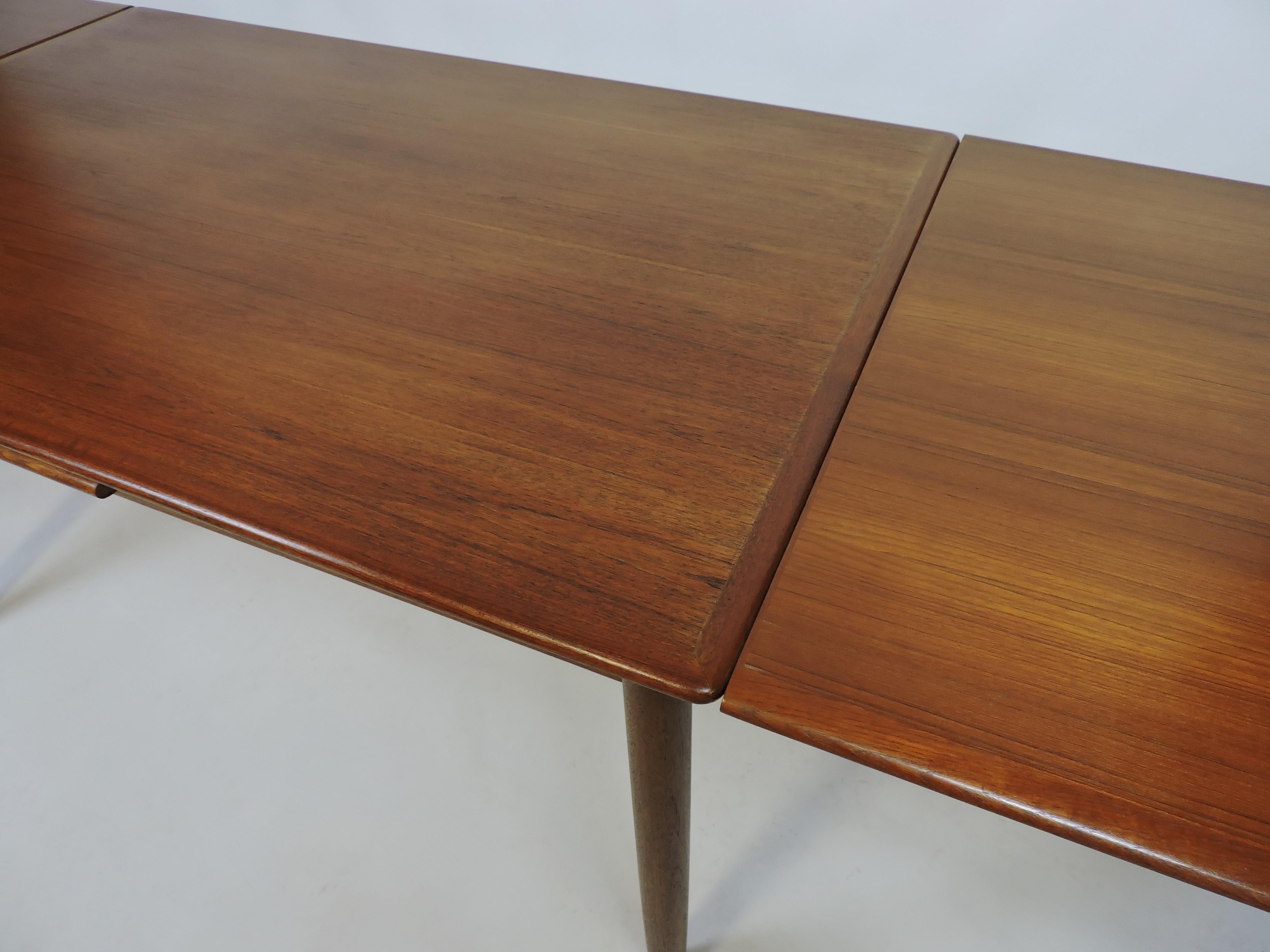 Large Danish Modern Teak Extendable Dining Table with Self-Storing Leaves 2