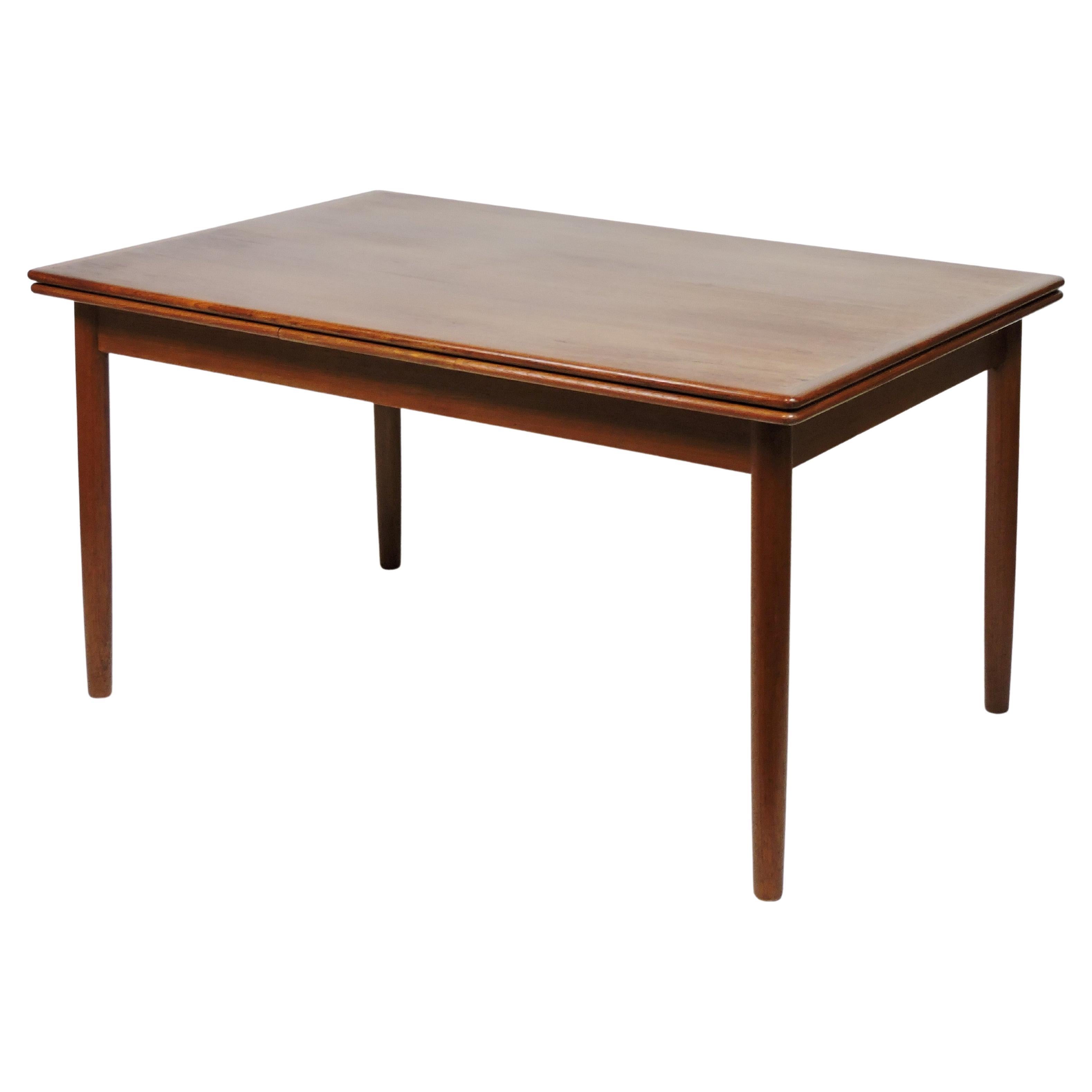 Large Danish Modern Teak Extendable Dining Table with Self-Storing Leaves