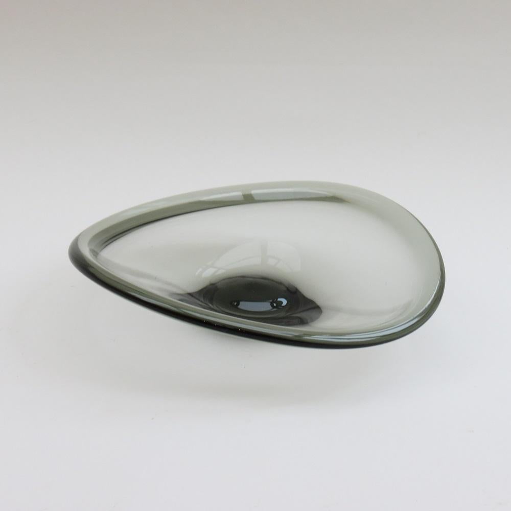 Wonderful large, handblown, glass bowl by Per Lutken for Holmegaard, circa 1960s. The piece entitled, 