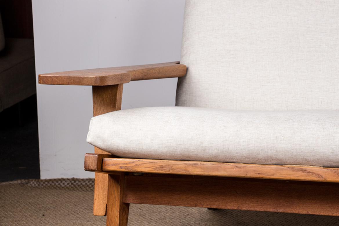 Mid-20th Century Large Danish Sofa, solid oak and fabric, model GE375 by Hans Wegner/Getama 1960. For Sale