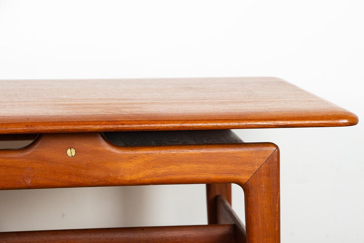Superb Scandinavian coffee table. Built on two levels, it features a document and magazine storage area on each side of the lower level. Simple and elegant design, beautifully crafted.

Designer: Danish.
Manufacturer: Stamped Danish