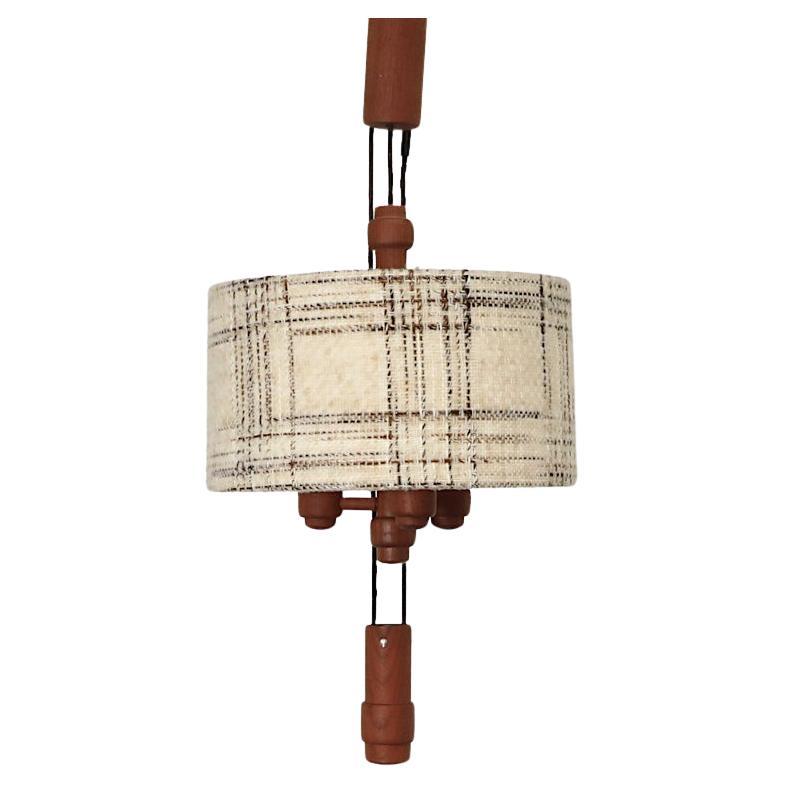 Grande lampe suspendue danoise en teck avec contrepoids par Domus 1960s en vente