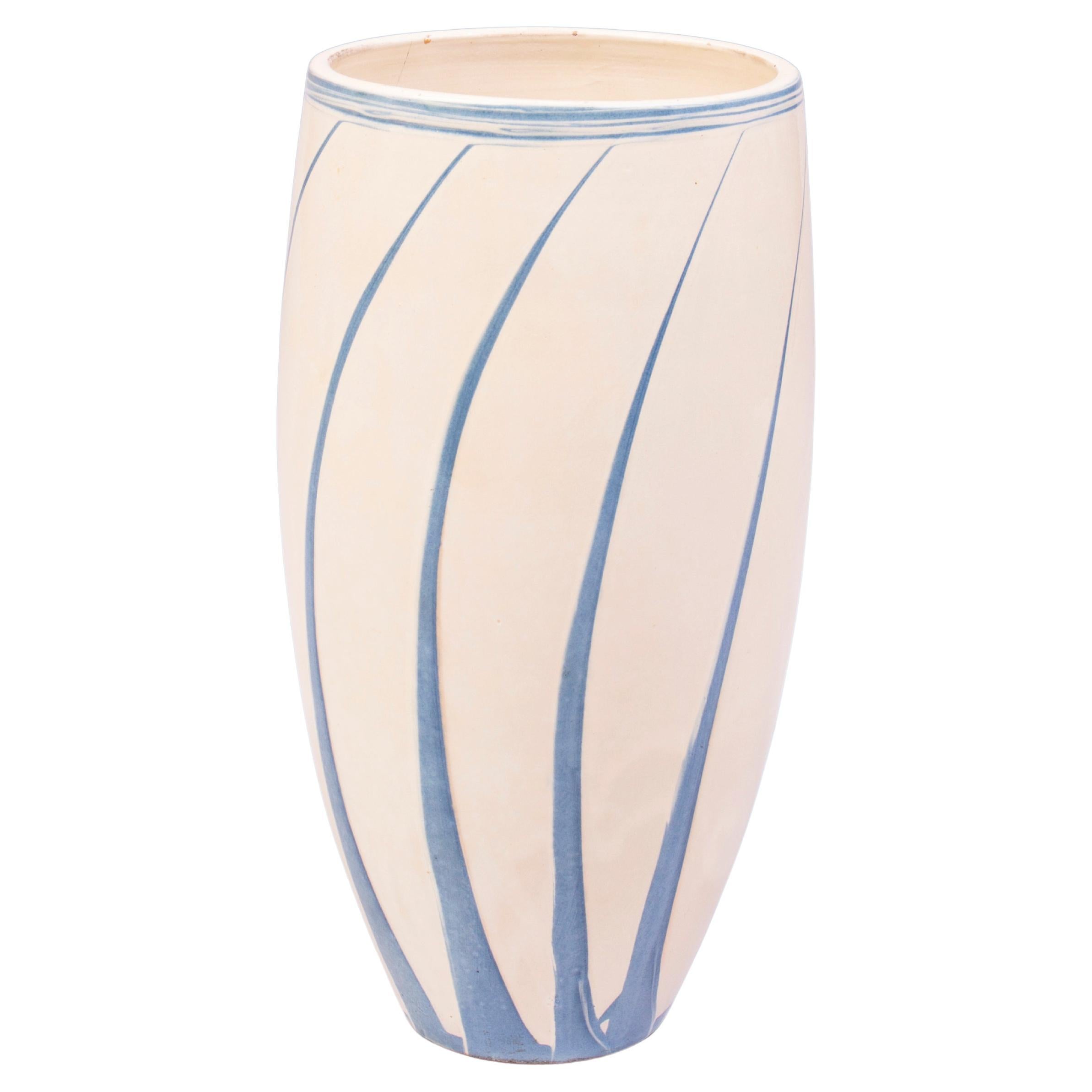 Large Danish vase with light blue stripes on a cream colored base 