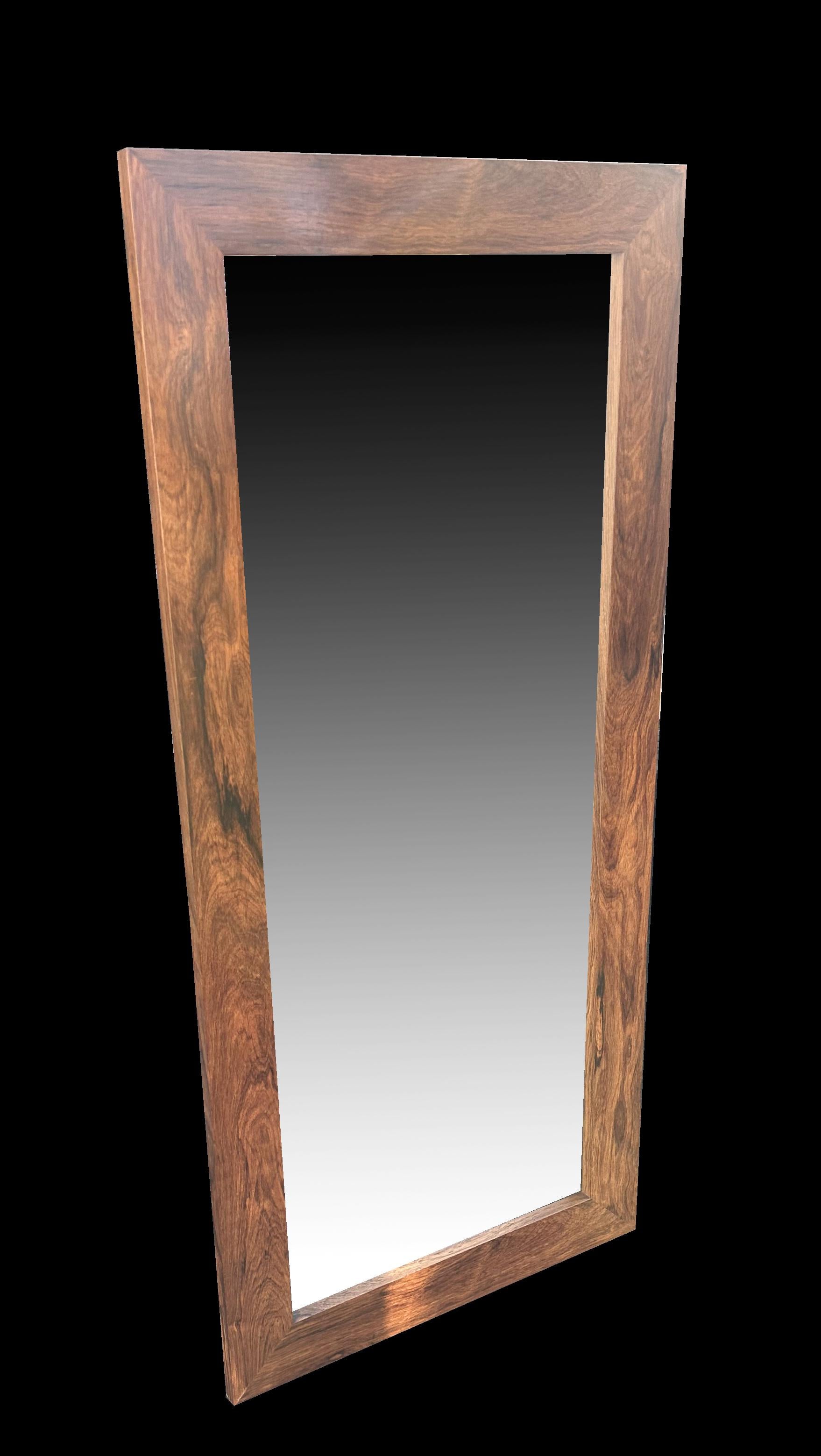 A very nice Santos Rosewood large wall mirror, all in good condition. The Rosewood used is Santos Rosewood (machaerium Scleroxylon) is not listed on CITES as a protected species so is no problem for import export.