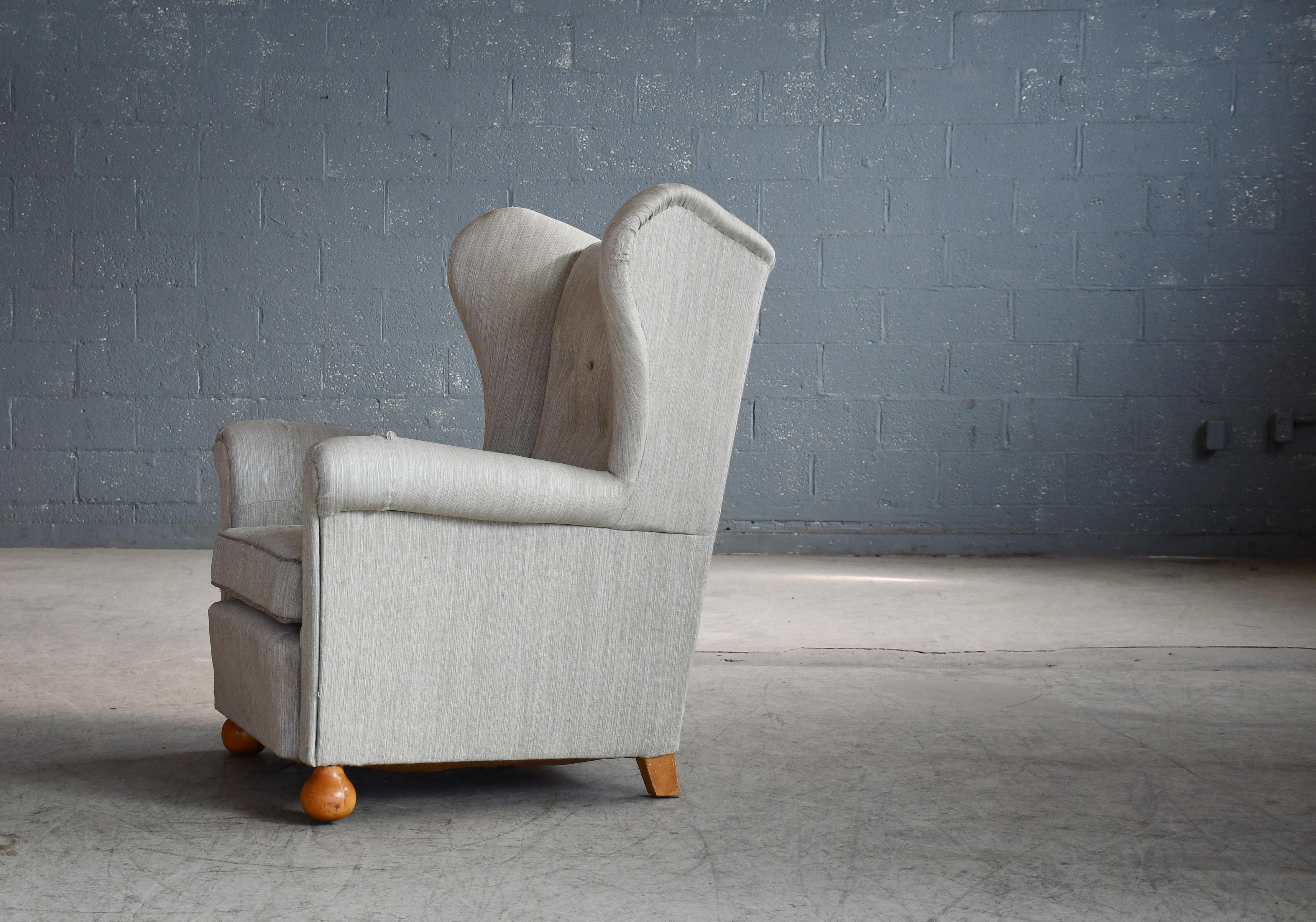 Large Danish Wingback Armchair with Bun Feet 1940's In Good Condition For Sale In Bridgeport, CT