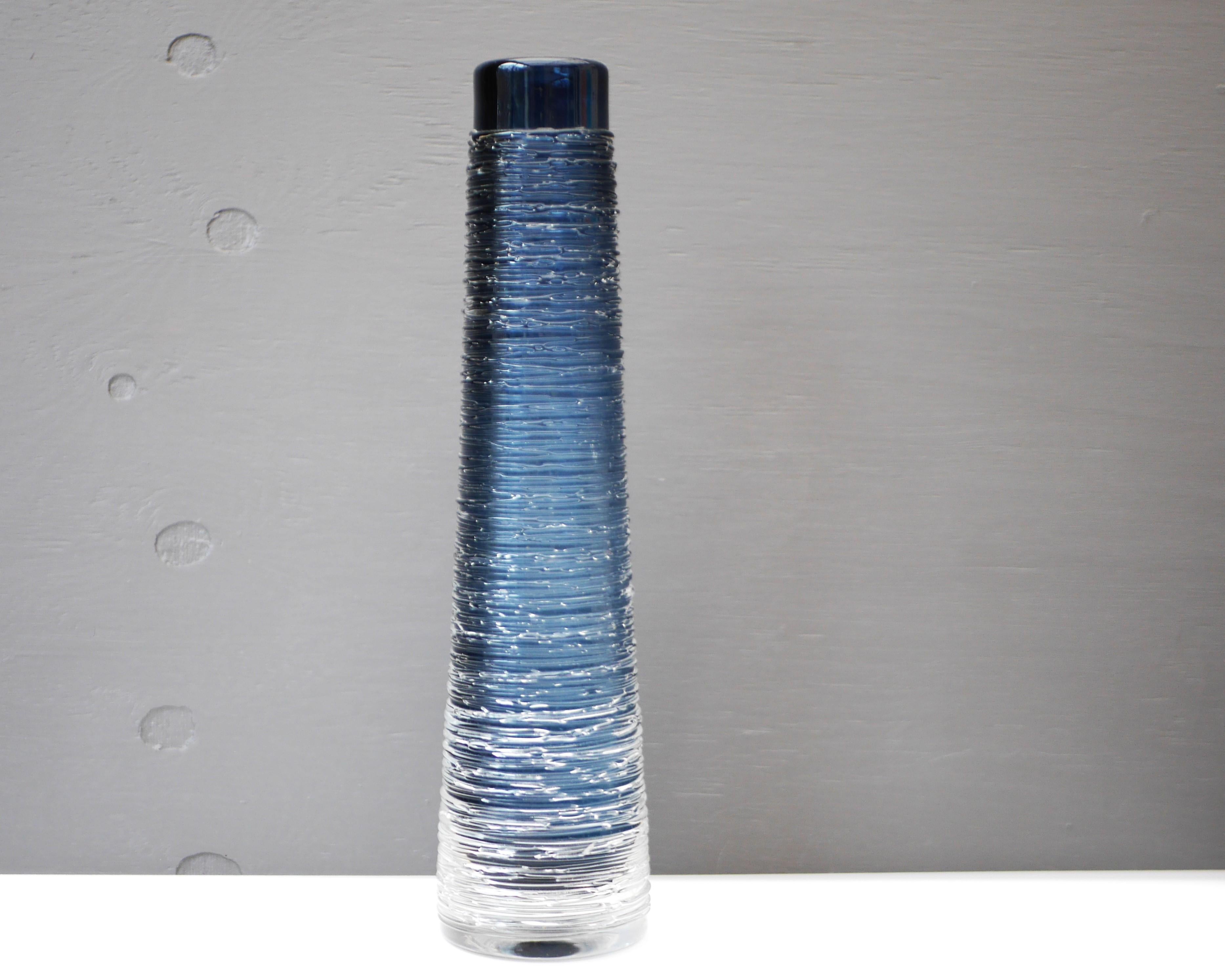 A large, dark blue glass vase by Bengt Edenfalk for Skruf Glassworks in Sweden, signed. From the 'Spun' series of vases. 

Bengt Edenfalk (1924-2016), was a Swedish glass designer, painter, graphic artist and sculptor, he was also involved in