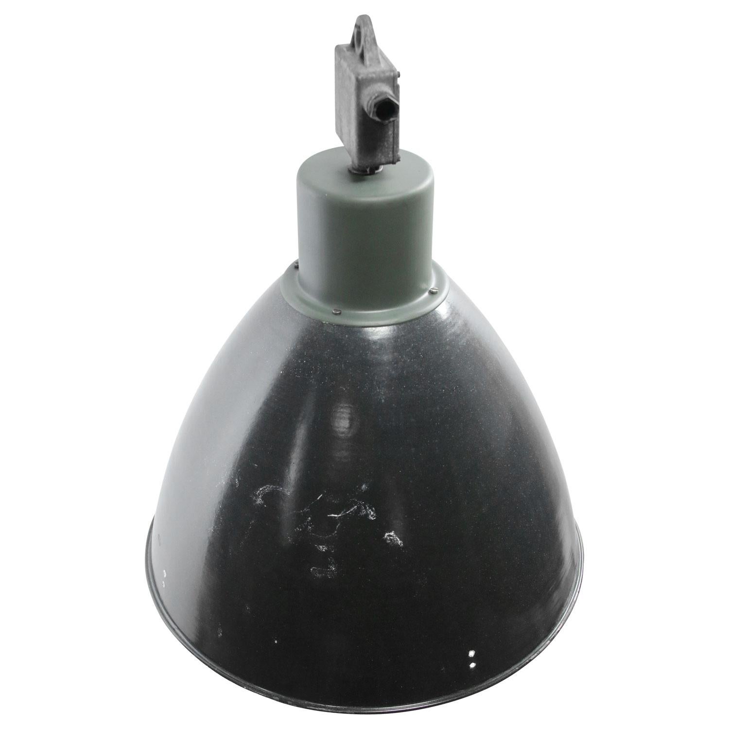 Industrial hanging lamp, dark gray enamel with white interior.
Cast aluminum top. 

Weight: 5.30 kg / 11.7 lb

Priced per individual item. All lamps have been made suitable by international standards for incandescent light bulbs,