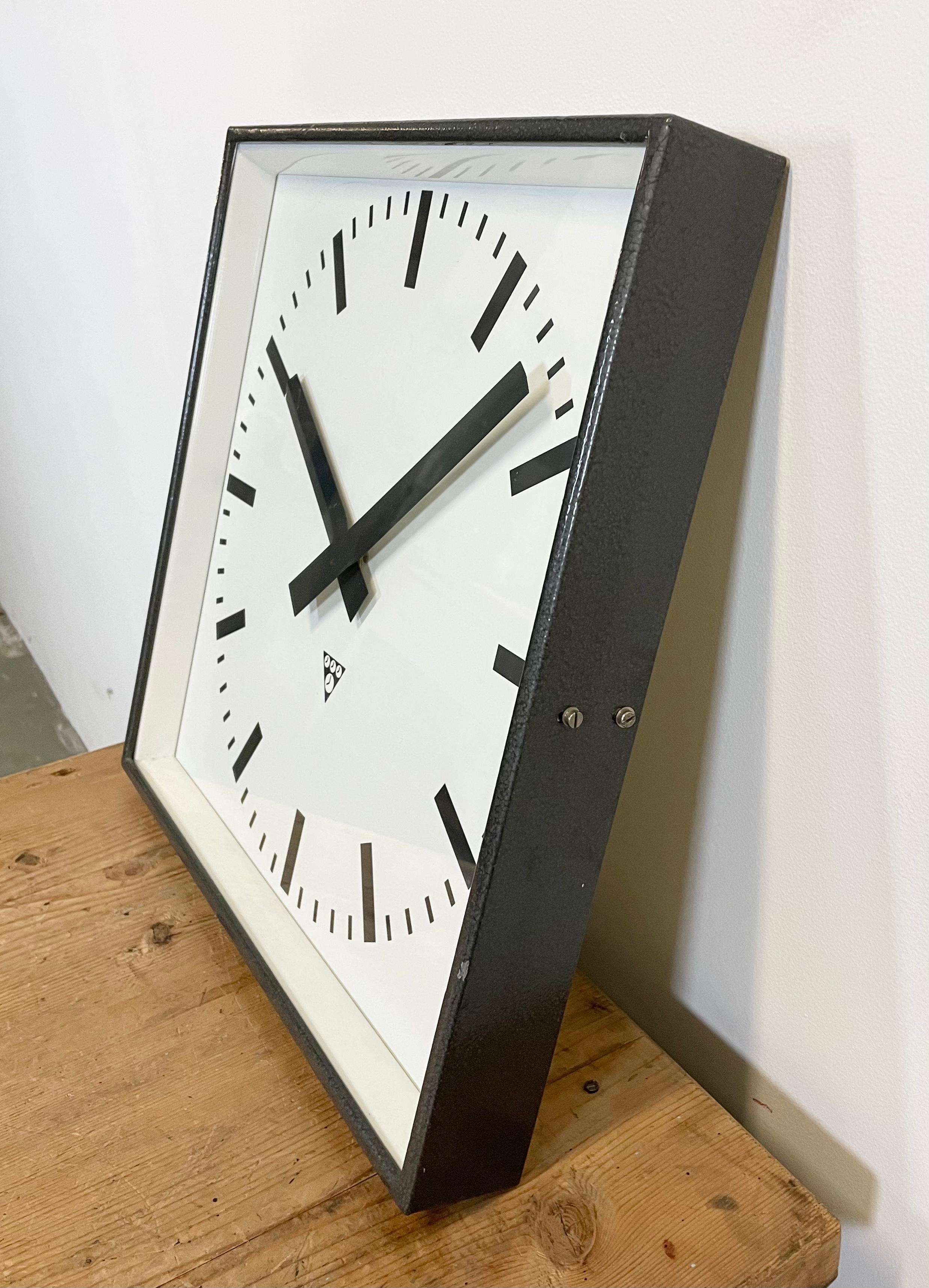 - Clock made by Pragotron in former Czechoslovakia during the 1960s
- Was used in factories, schools & railway stations
- Features a dark gray Hammer paint finish metal body, aluminum dial, clear glass
- Has been converted into a battery-powered