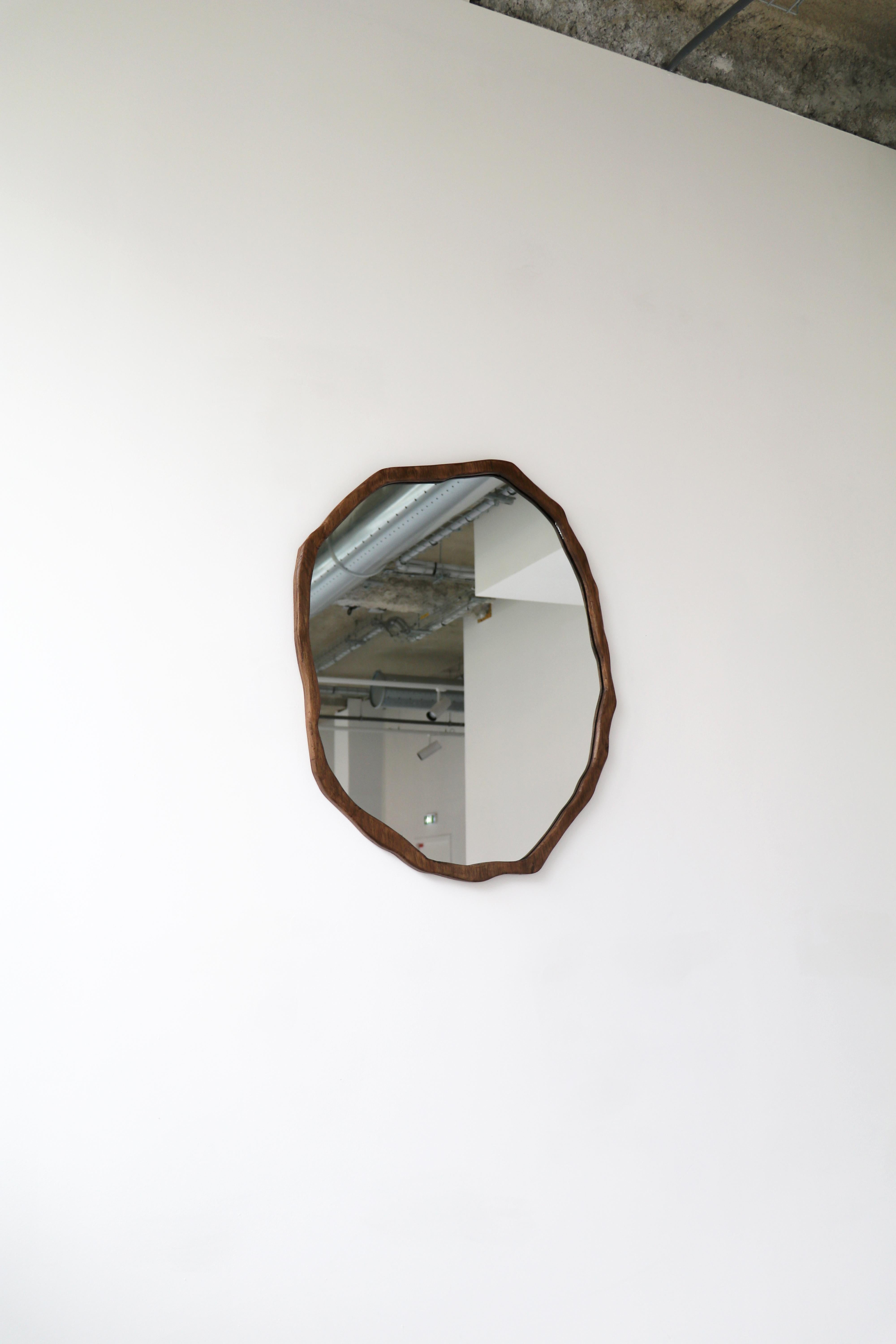 Large Dark Varnish Ondulation mirror by Alice Lahana Studio
One of a kind.
Dimensions: Ø 55 x H 65 cm.
Materials: Dark oak.
Available finishes: Light and dark varnish. 

Every mirror is unique. The shape slightly varies from edition to edition.