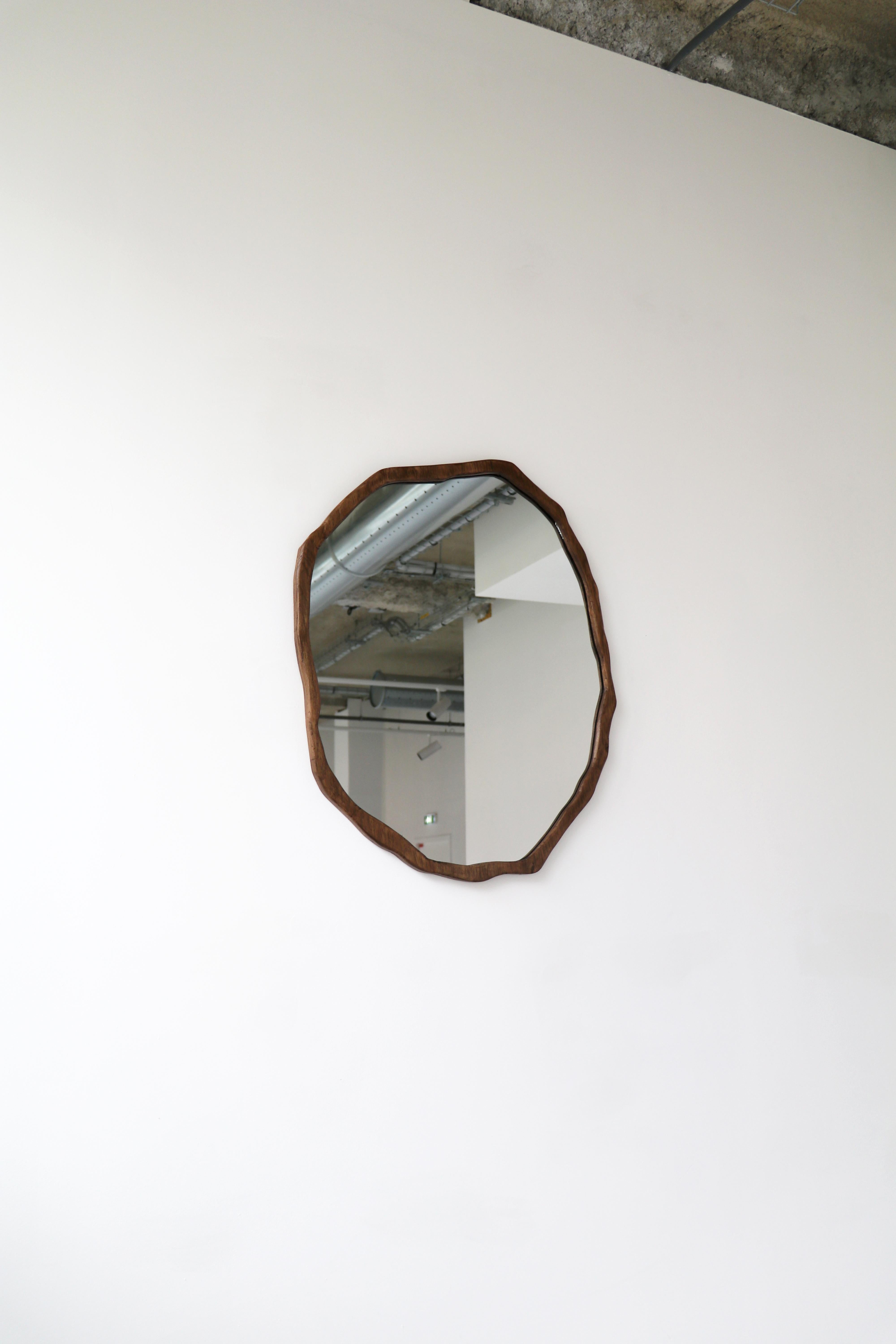 Large Dark Varnish Ondulation mirror by Alice Lahana Studio
One of a kind.
Dimensions: Ø 60 x H 70 cm.
Materials: Dark oak.
Available finishes: Light and dark varnish. 

Every mirror is unique. The shape slightly varies from edition to edition.