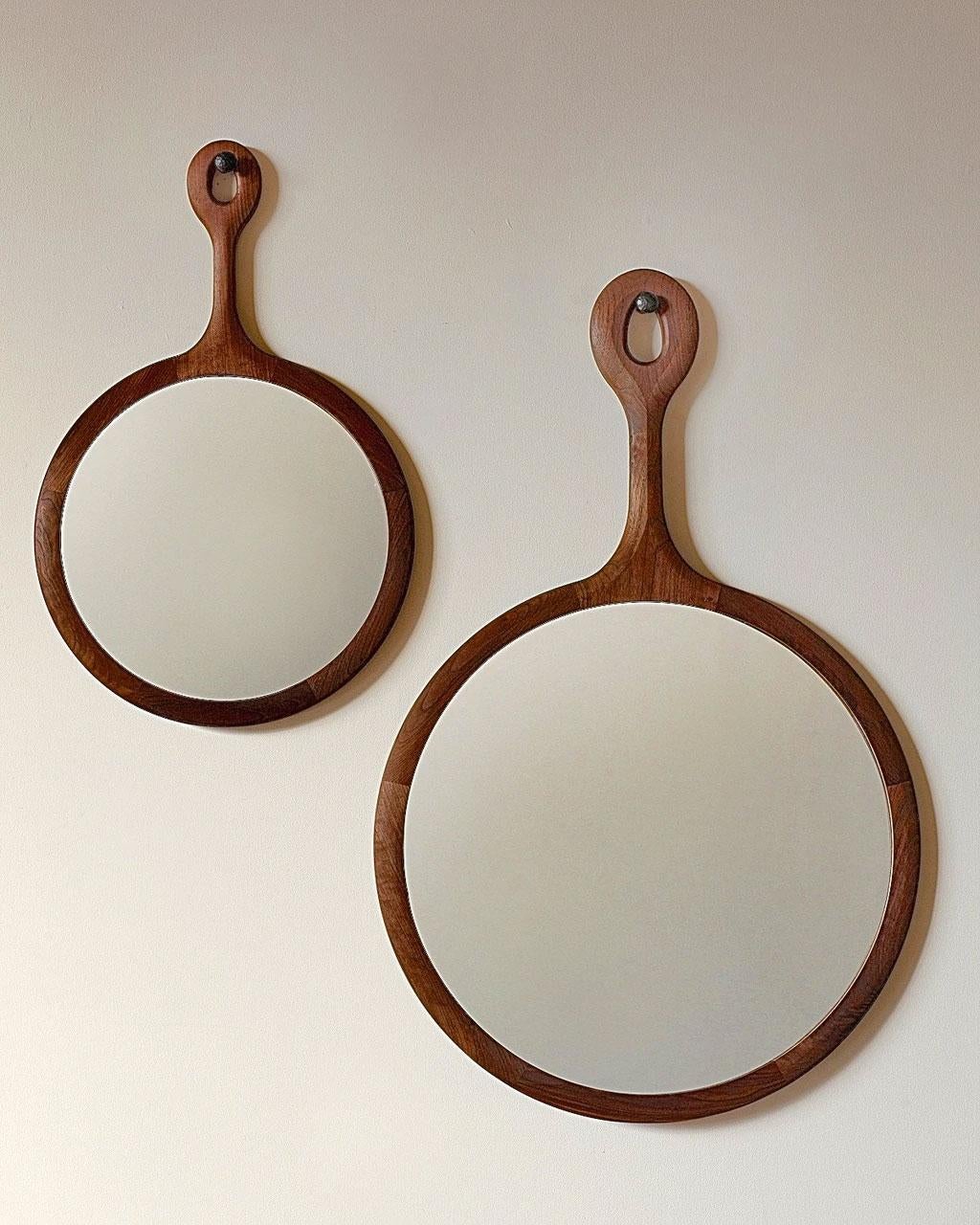 The Sophia mirror is framed in wooden dark maple with a long neck resembling an oversized hand mirror. Handcrafted in Pennsylvania, the Sophia comes with a hand-hammered iron peg for hanging. The medium is a lovely size above a dresser or in a