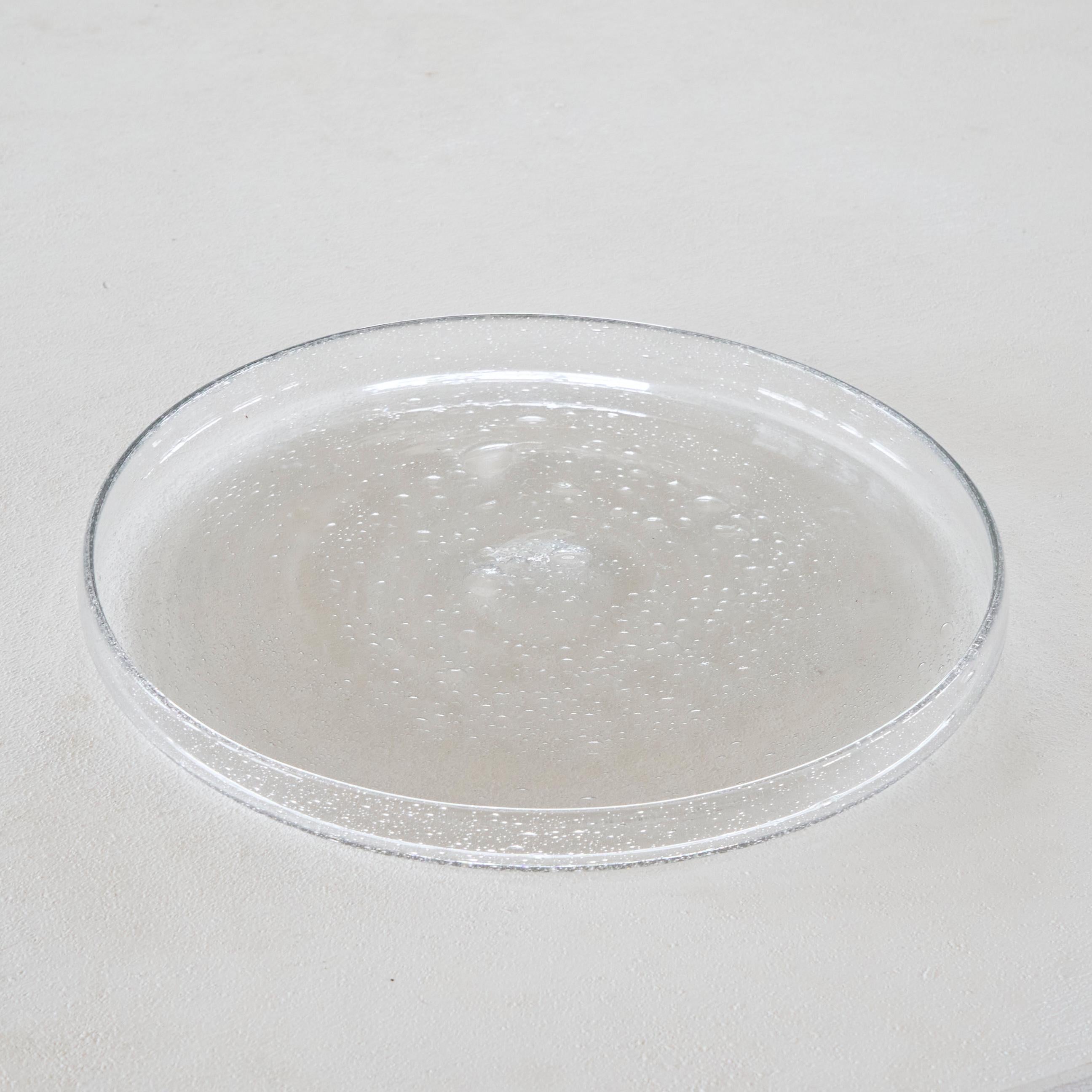 Large Daum France Glass Platter with Bubbles Mid 20th Century.

A beautiful and large art glass platter or dish or centerpiece by Daum, France. Mid 20th century. It shows a wonderful simple and airy design with a lot of bubbles in the glass - yet
