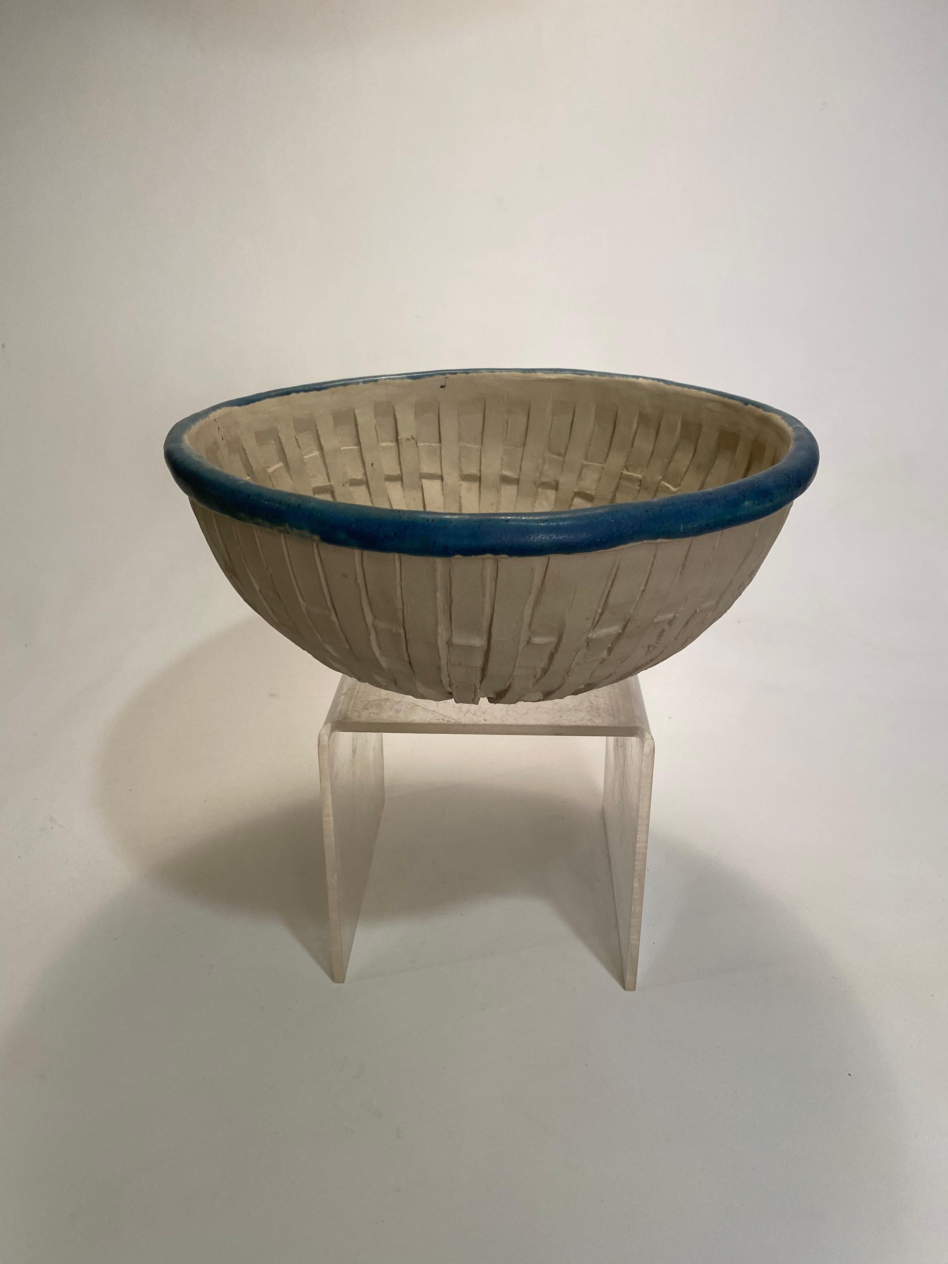Very fine large hand carved David Gil bowl for Bennington Potters, Vermont. Blue glazed applied lip with a hand carved lattice decoration adorning the interior and exterior of the bowl. A very good example of the hand crafted piece coming from The