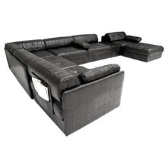 Gran sofá seccional De Sede DS-88 de cuero negro, Suiza, años 70