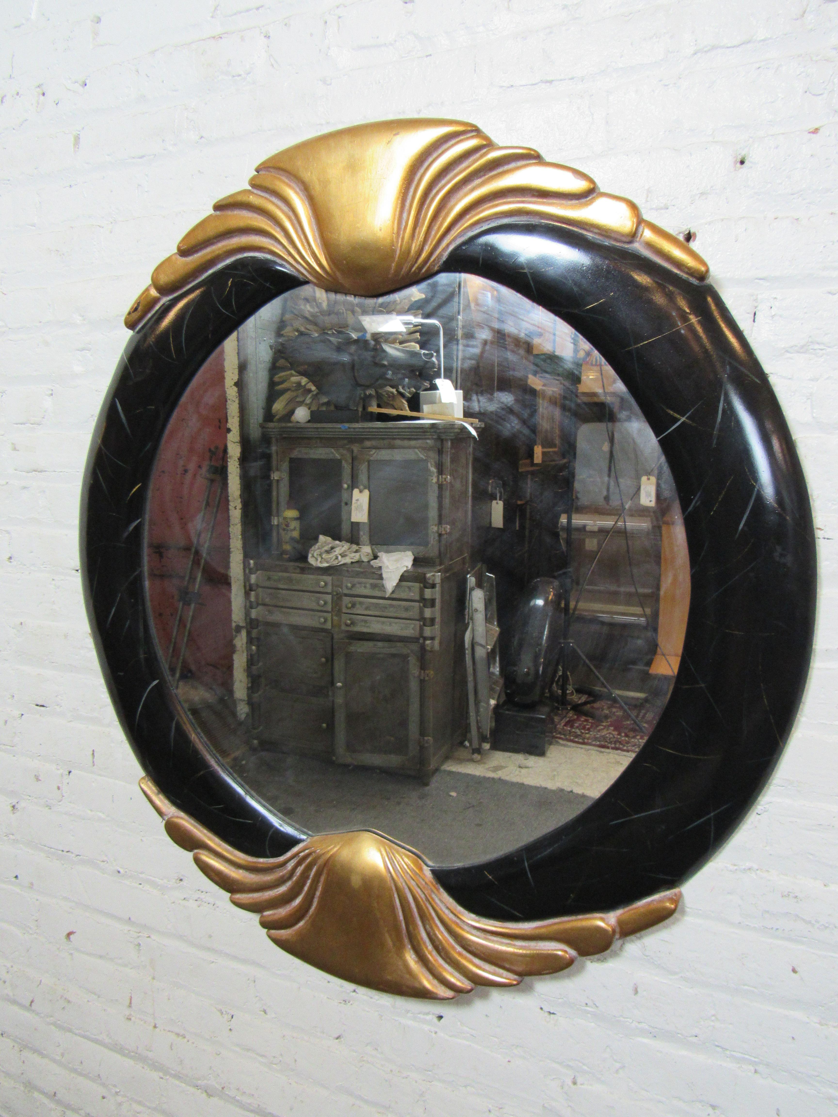 Art Deco style mirror with gold painted sculpted motif.
(Please confirm location NY or NJ).