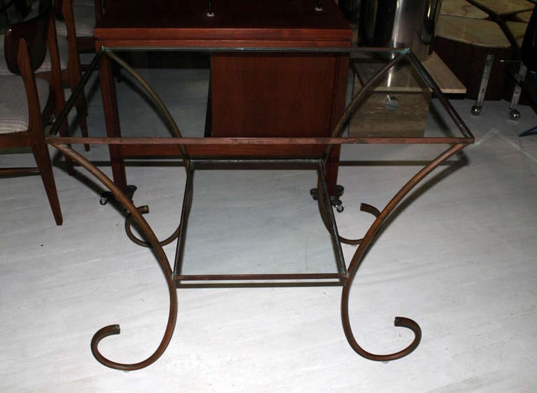 Large Deco Style Solid Brass Serving Console Hall Table circa 1930s Nice Patina.
Stylish scroll shape legs