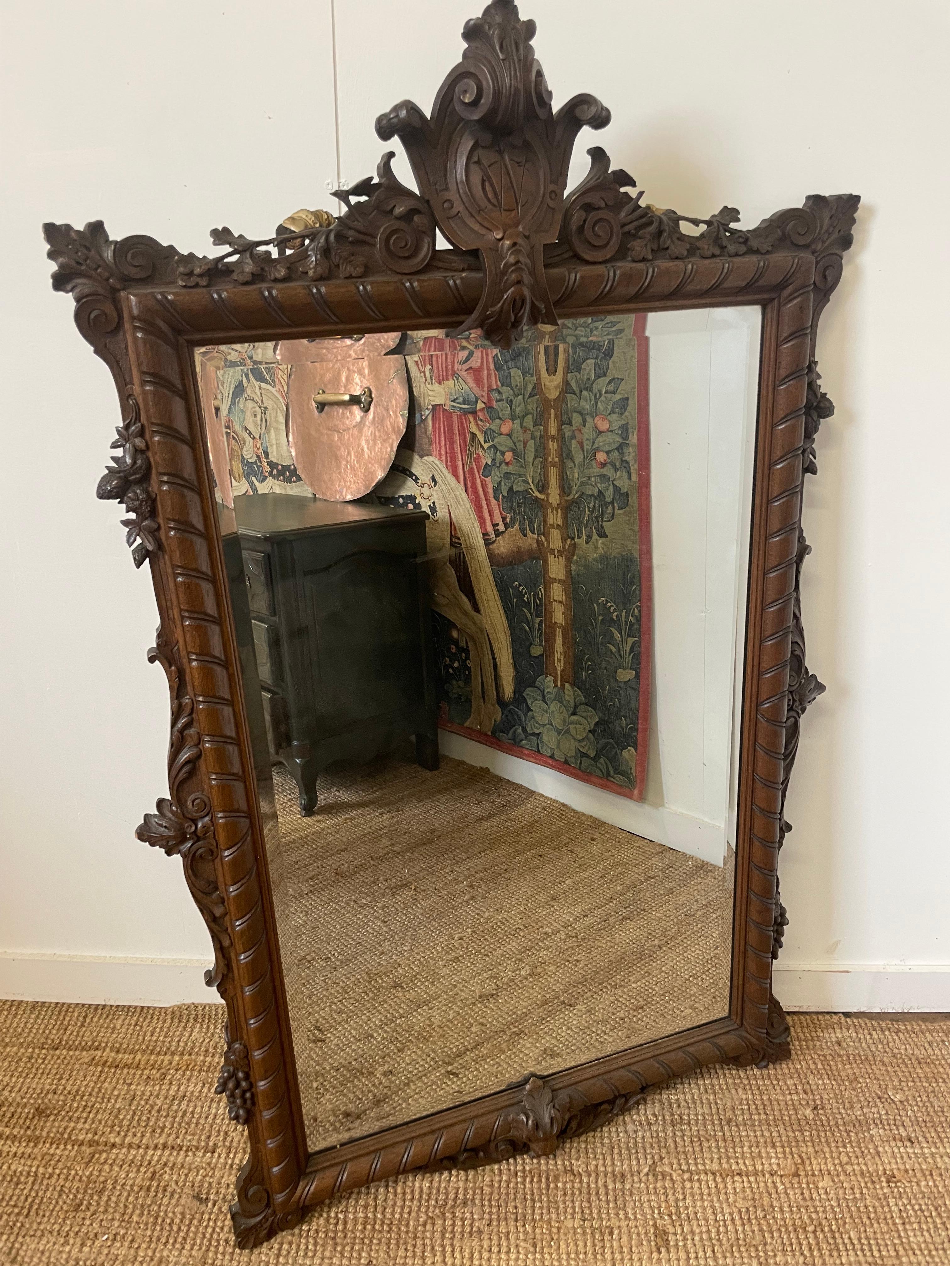 Very decorative large 19th century carved oak mirror
French circa 1860’s with original bevelled mirror and backboards
Few minor losses to the carving at the top
37 x 61.5 inches