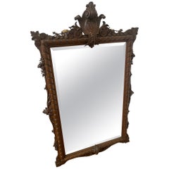 Large decorative carved oak mirror
