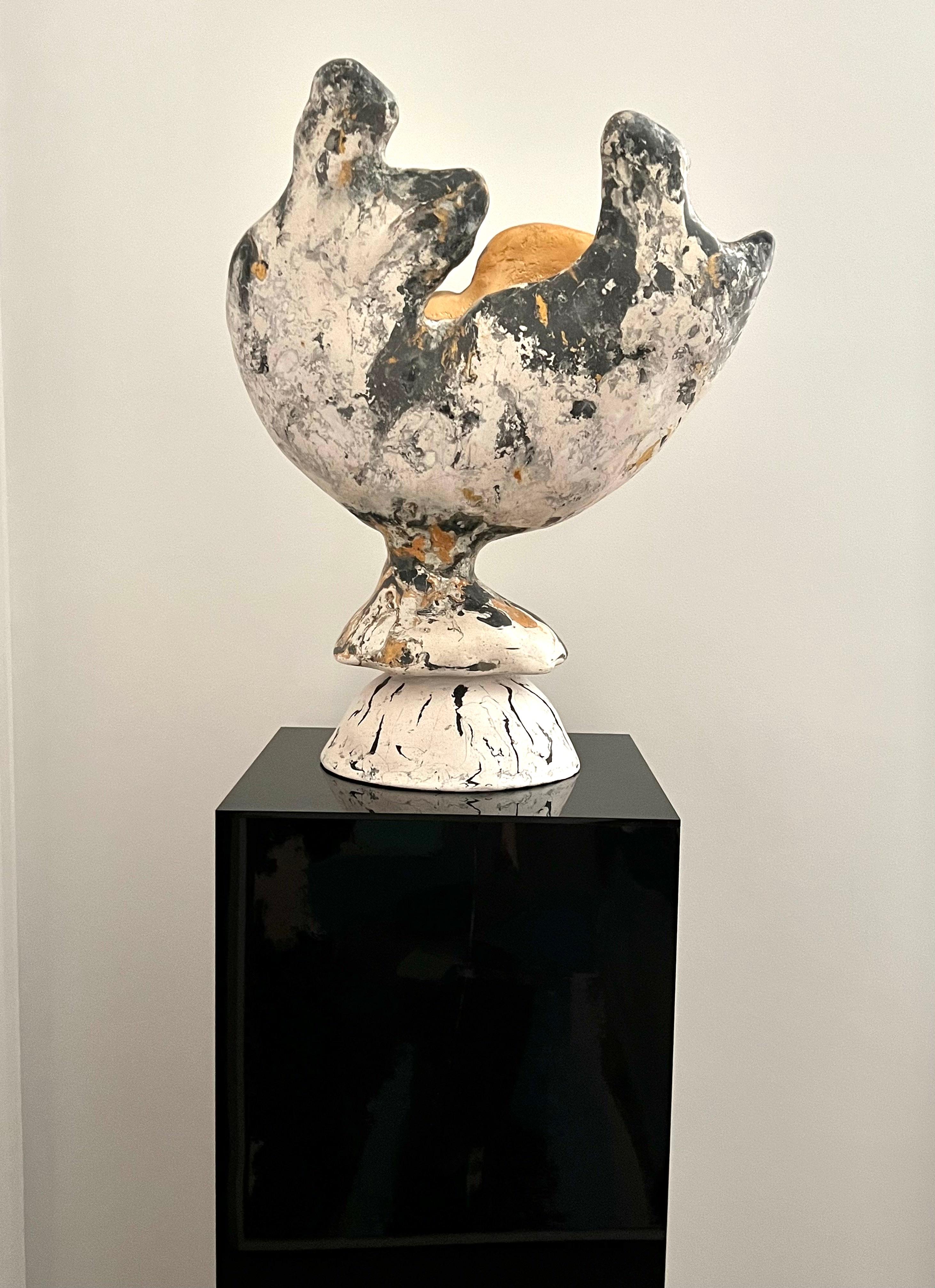 A one of a kind, large centerpiece bowl is handcrafted from pigmented scagliola (stucco).  With its organic asymmetrical shape, this beautiful piece is crafted in three sections, each features a unique mix of composites and pigments that complement