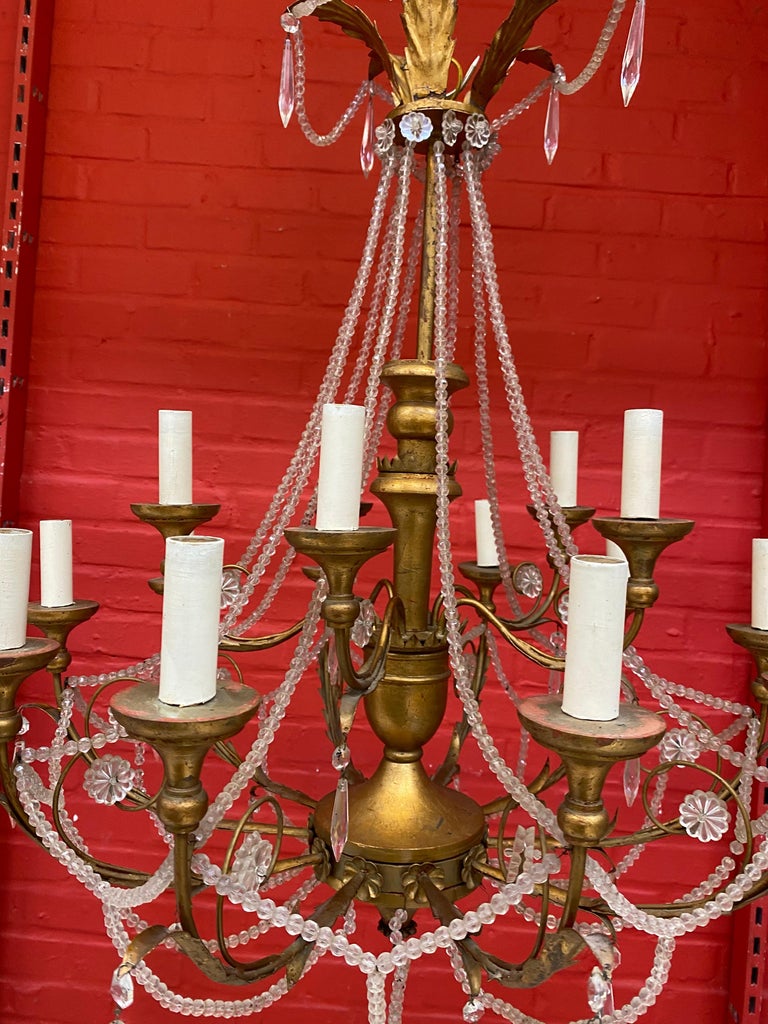 Large Decorative Chandelier in Wood and Gilded Iron, circa 1950 For