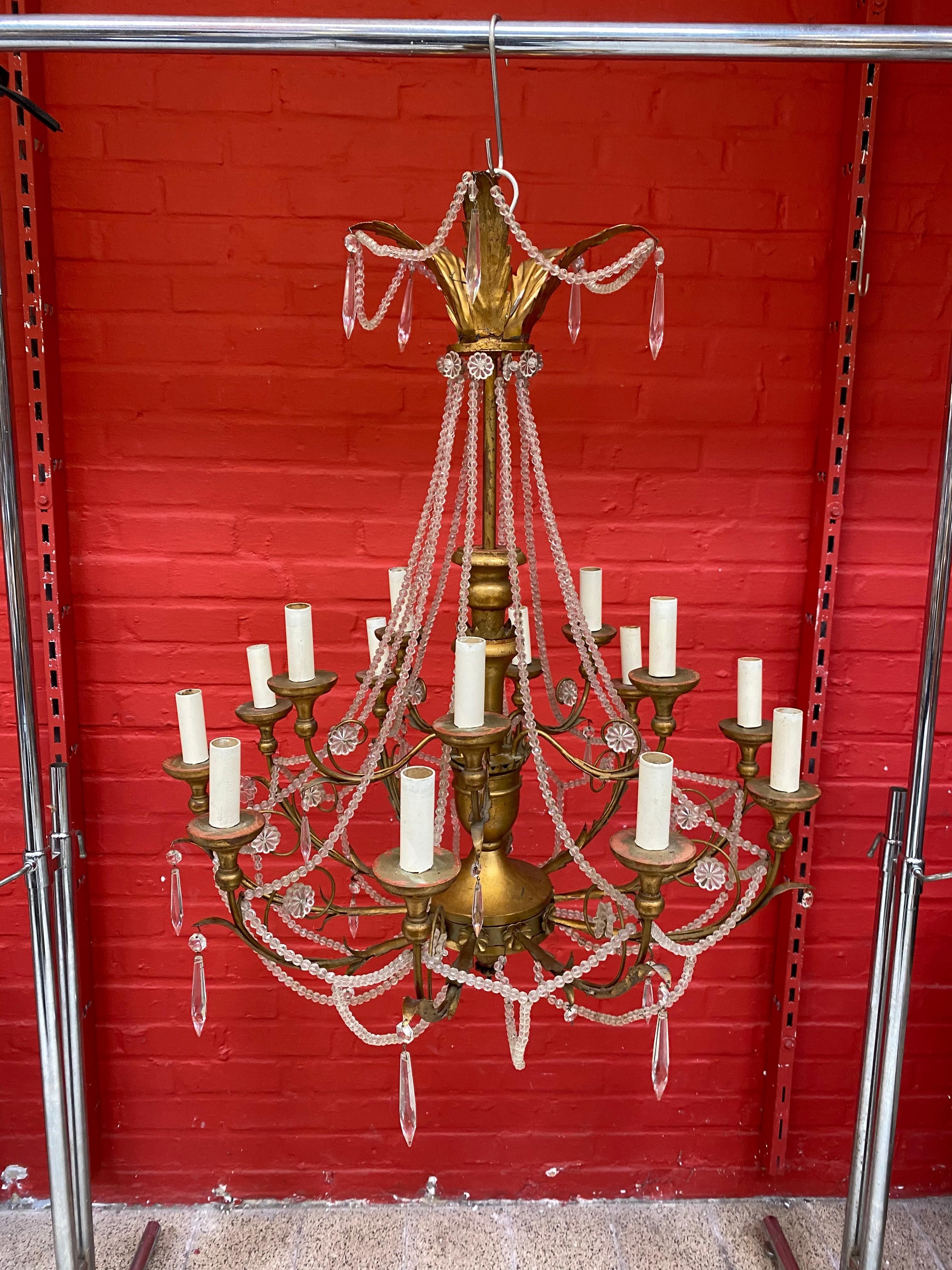 Gilt Large Decorative Chandelier in Wood and Gilded Iron, circa 1950 For Sale