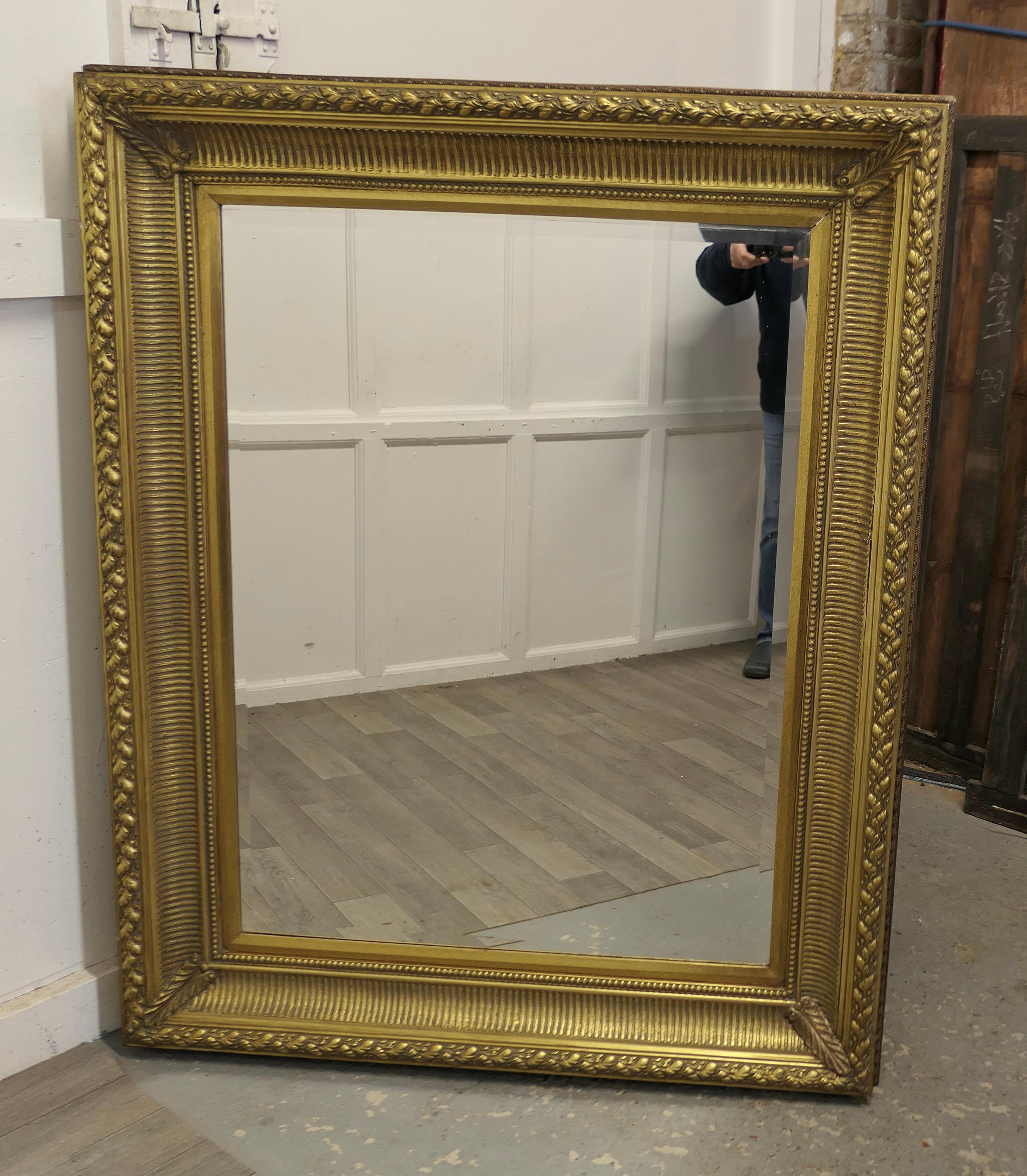 Large decorative gilt wall mirror.


This is a lovely old mirror, it is set in a Decorative Gilt 7” wide Frame, 
The bevelled looking Glass is original and has very few imperfections certainly nothing that effects its use, the mirror can be hung