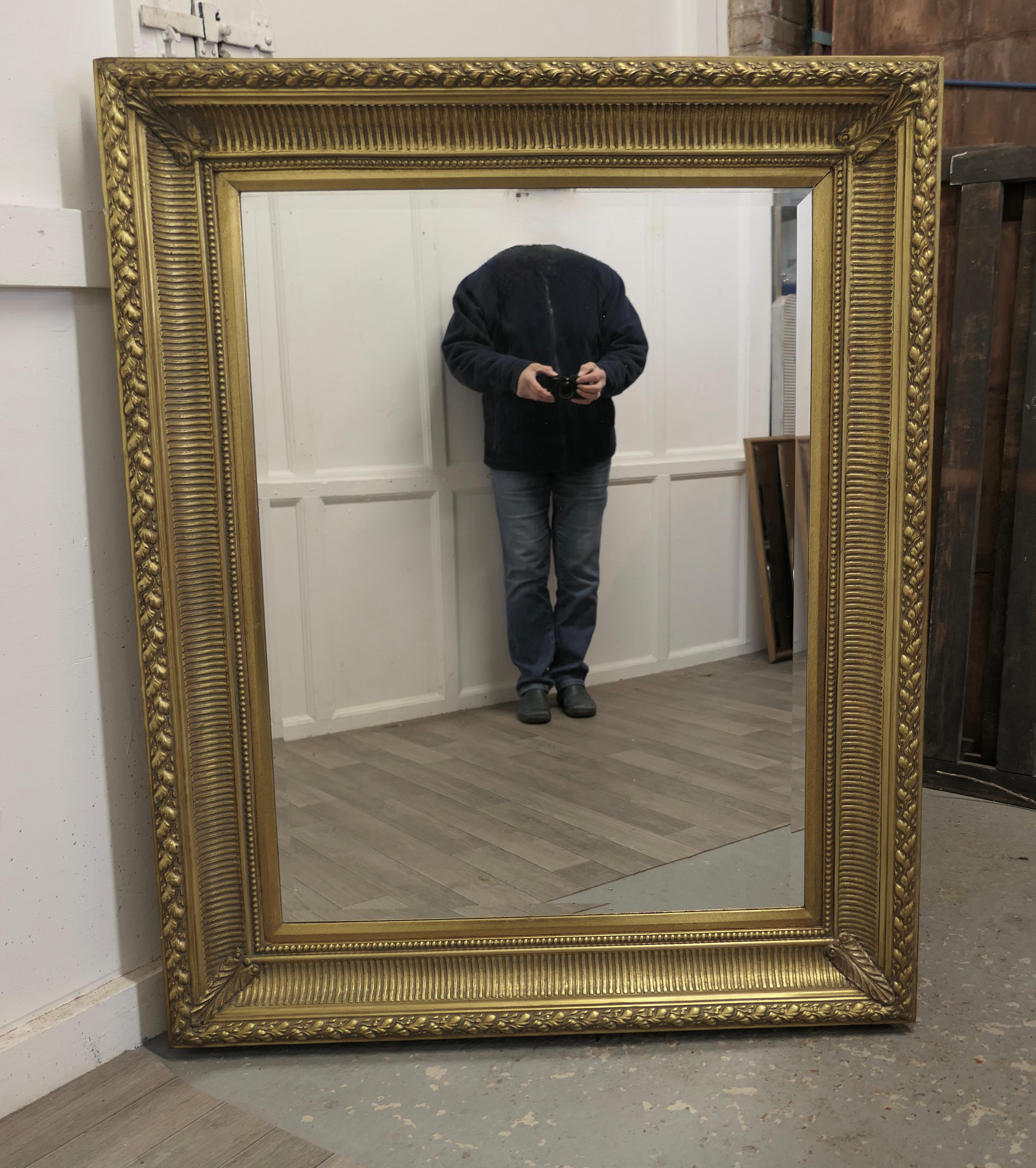 Adam Style Large Decorative Gilt Wall Mirror This Is a Lovely Old Mirror For Sale