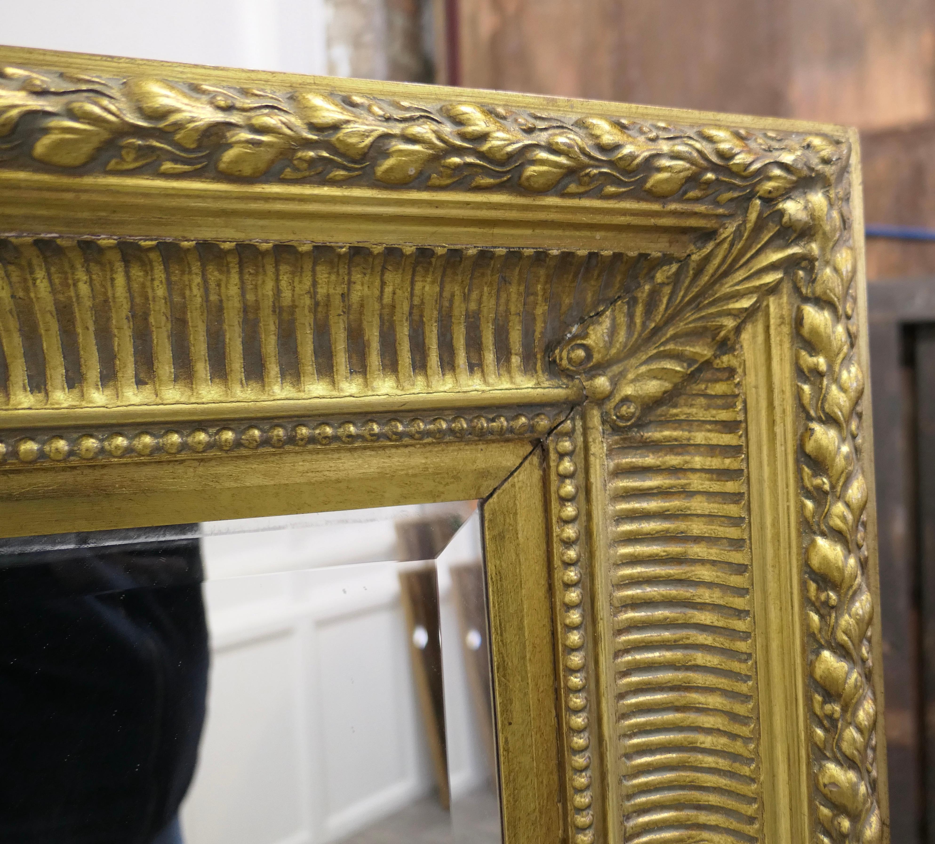 20th Century Large Decorative Gilt Wall Mirror This Is a Lovely Old Mirror For Sale