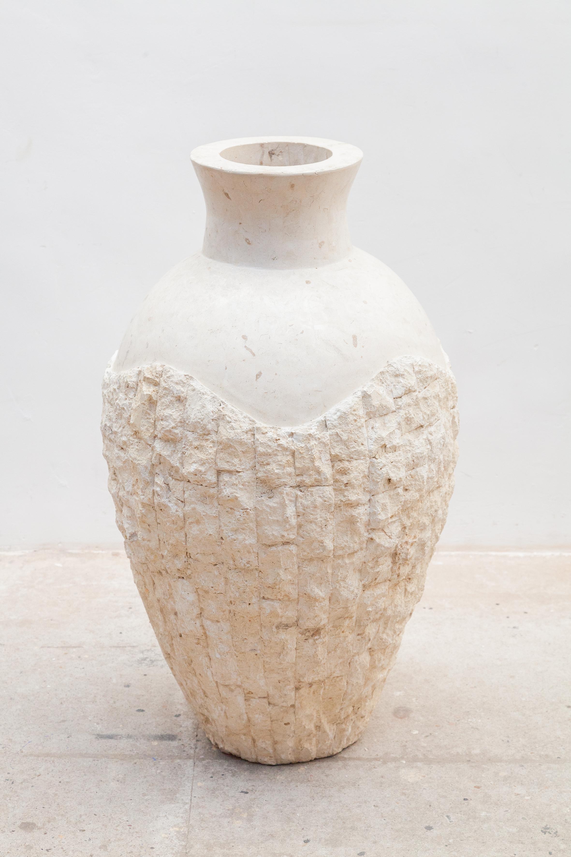 Massive mid-century Mactan marble stone mosaic floor vase with countless naturalistic subtle colored stone marble covering the entire surface.Can be used indoors or outdoors.Very decorative and perfect condition.
Dimensions: Large vase 93-51 cm.