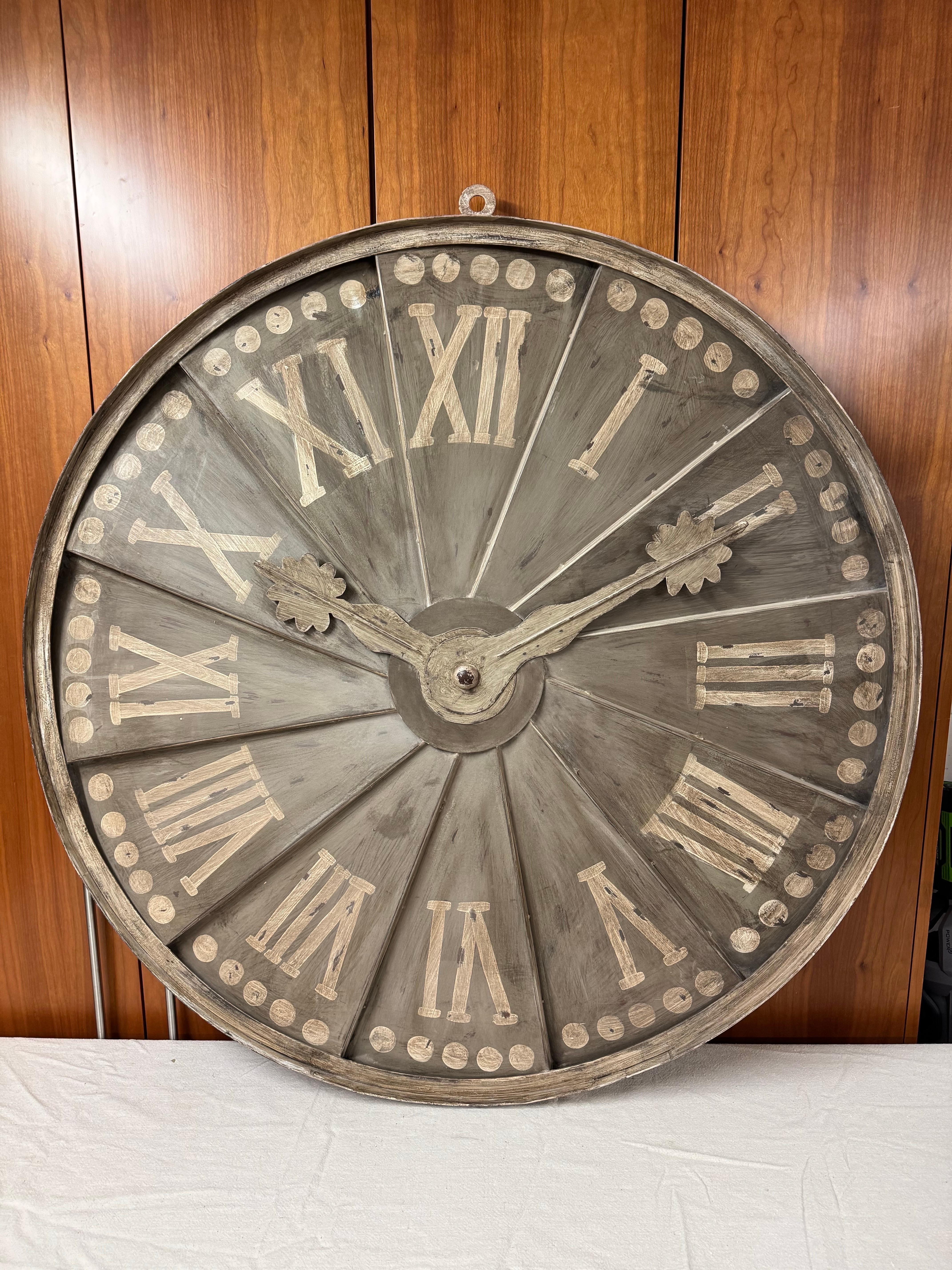 Large Decorative Metal Wall Clock. Attributed to Ethan Allen. Heavy and well constructed. This is decorative clock only and does not function as a time telling clock. Great for a modern farmhouse or industrial building.
