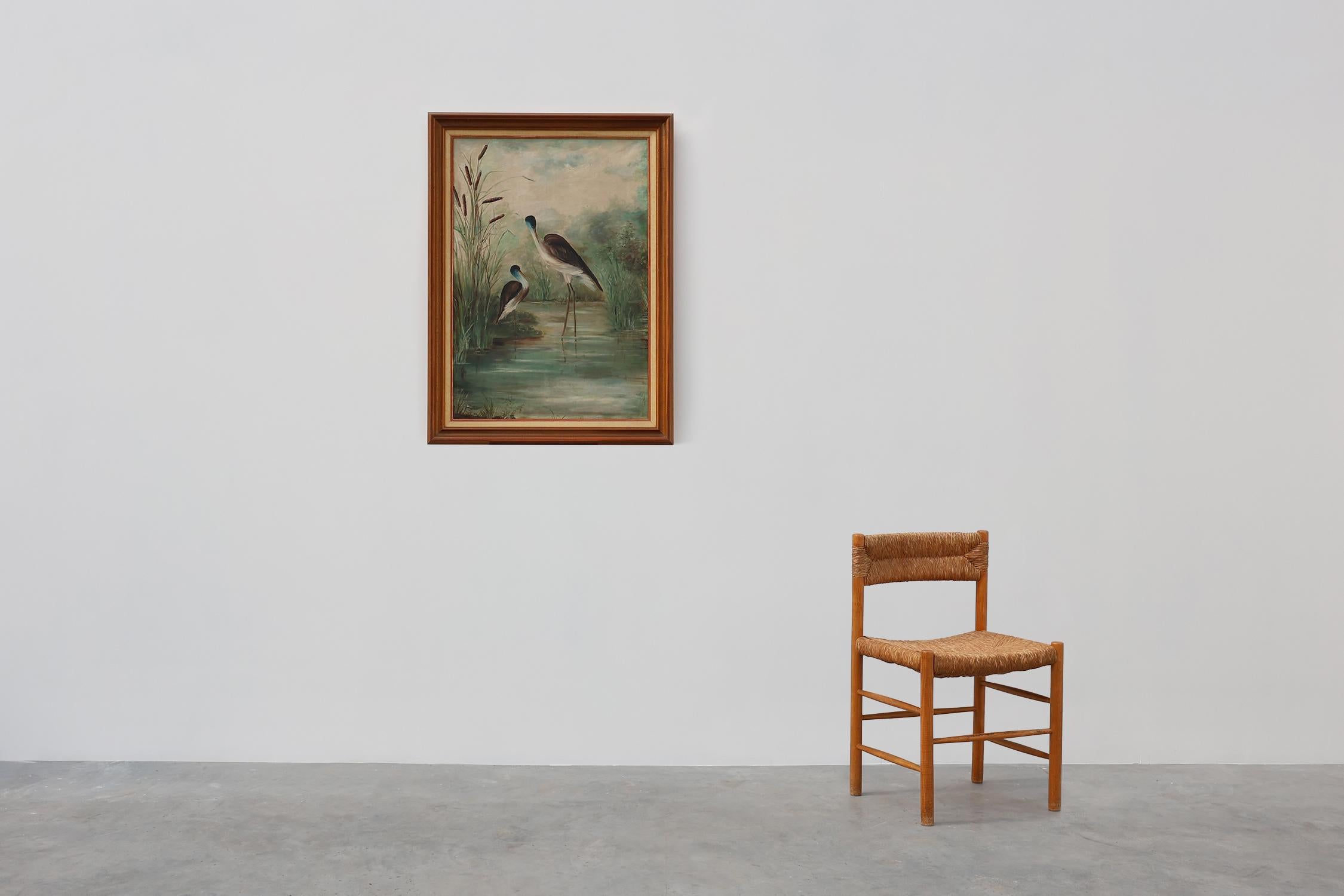 France / 1960 / Peinture / bois, toile / Milieu du siècle / Vintage

Peinture française des années 1960 représentant deux oiseaux gracieux se tenant dans un plan d'eau bas. Ce tableau décoratif a un beau cadre en bois.

L'artiste capture de façon