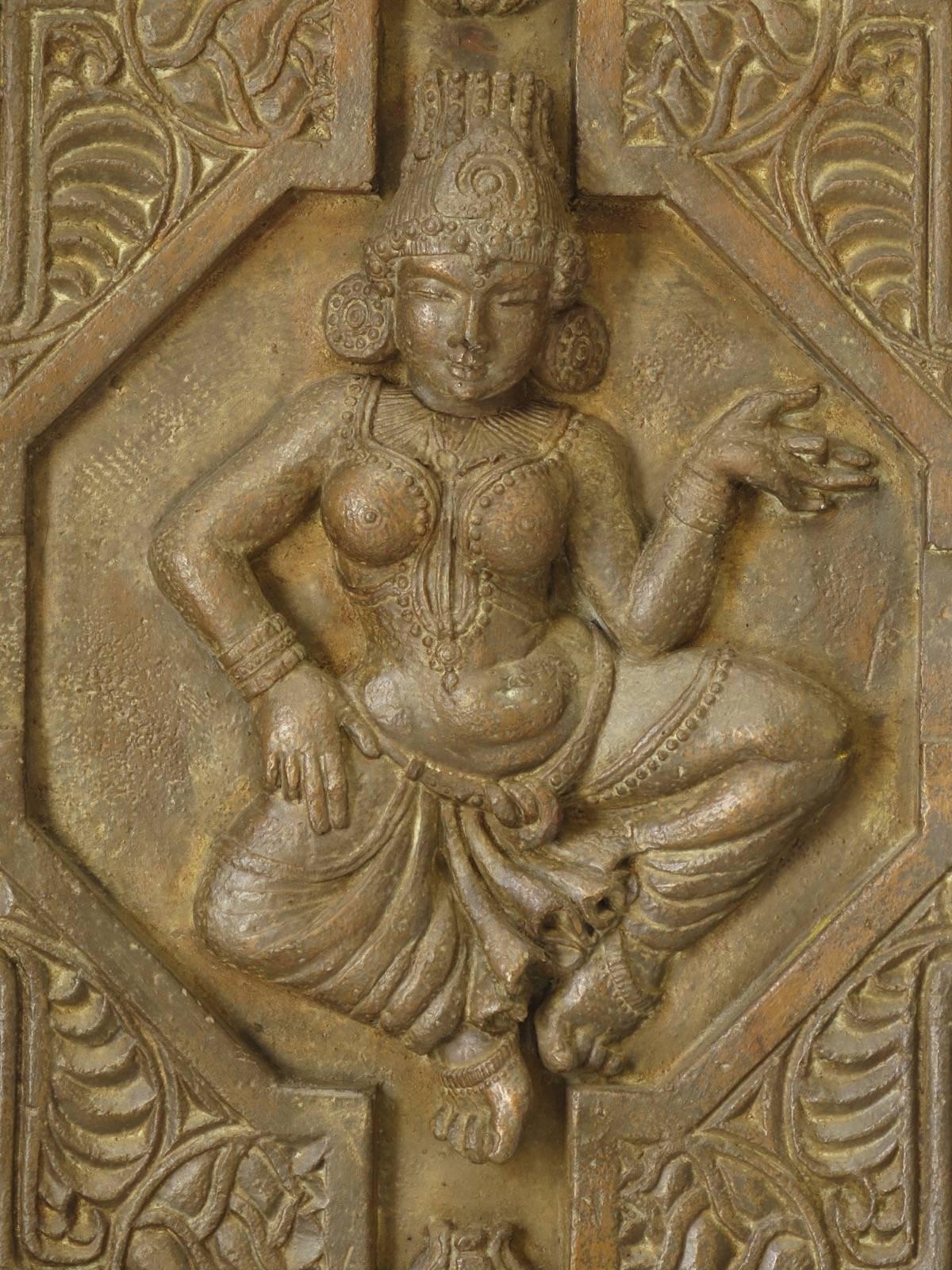 Large fiberglass panel with a bronze-coloured paint finish, representing a dancing Indian deity. Possibly originally made as part of a theatre decor. An unusual and quite effective piece.