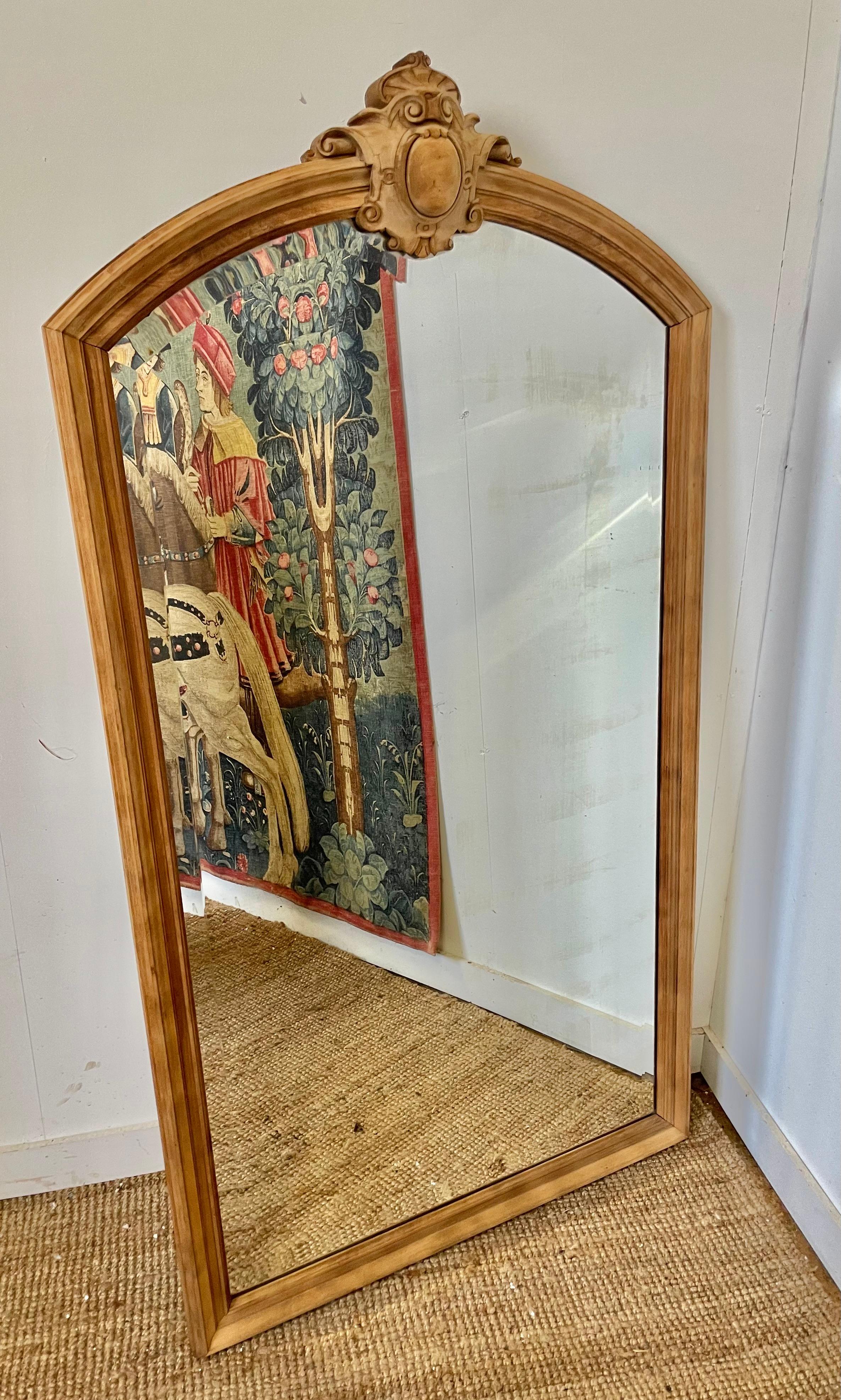 Very stylish late 19th Century raw walnut large wall mirror. 

Of French origin, circa 1880’s. The bevelled mirror is mounted inside a solid walnut frame which has been cleaned and scrubbed to give it a contemporary. 

H
: 173 cm (68 1/8
