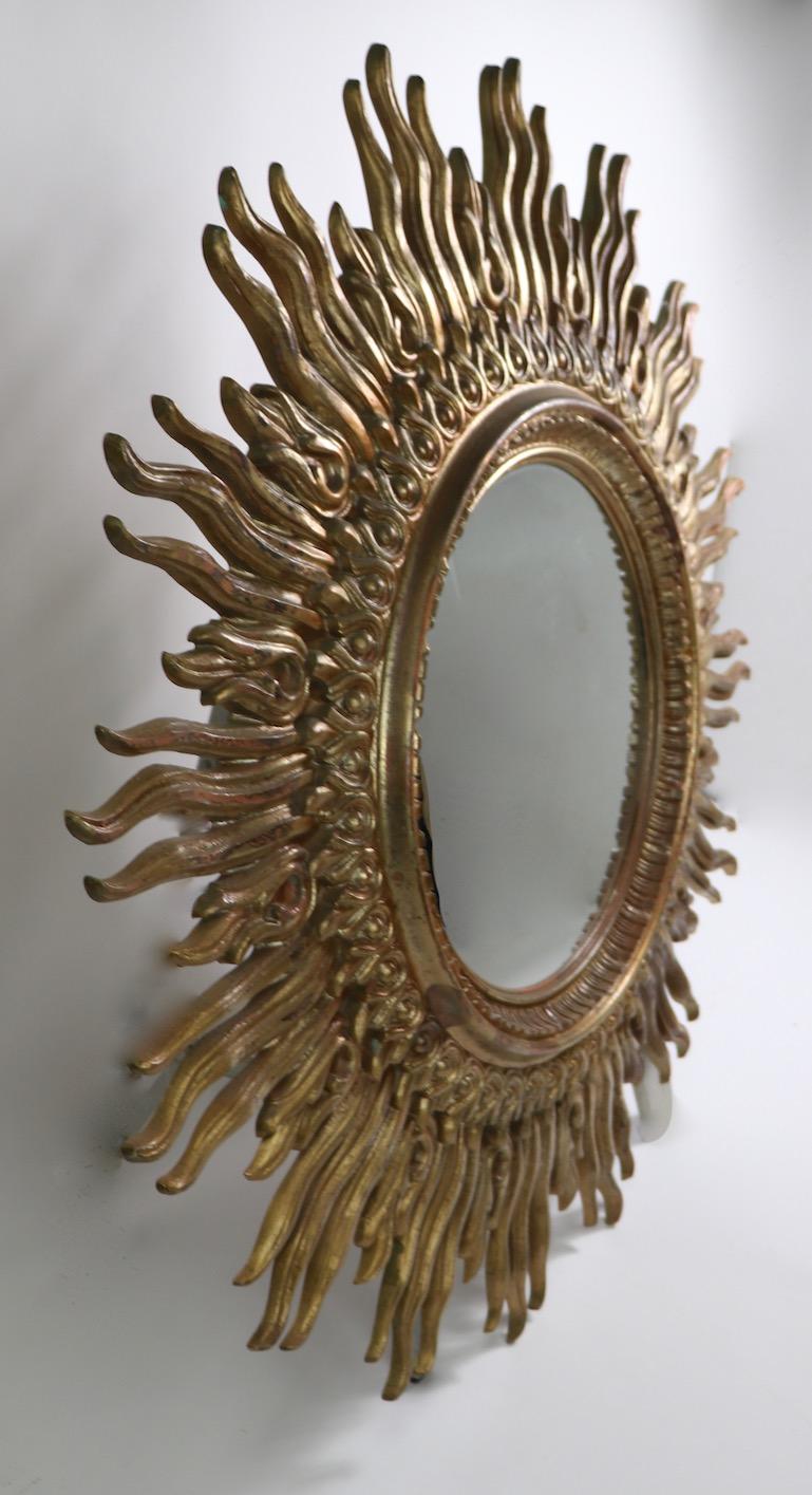 20th Century Large Decorative Sunburst Starburst Mirror with Cast Plastic Frame