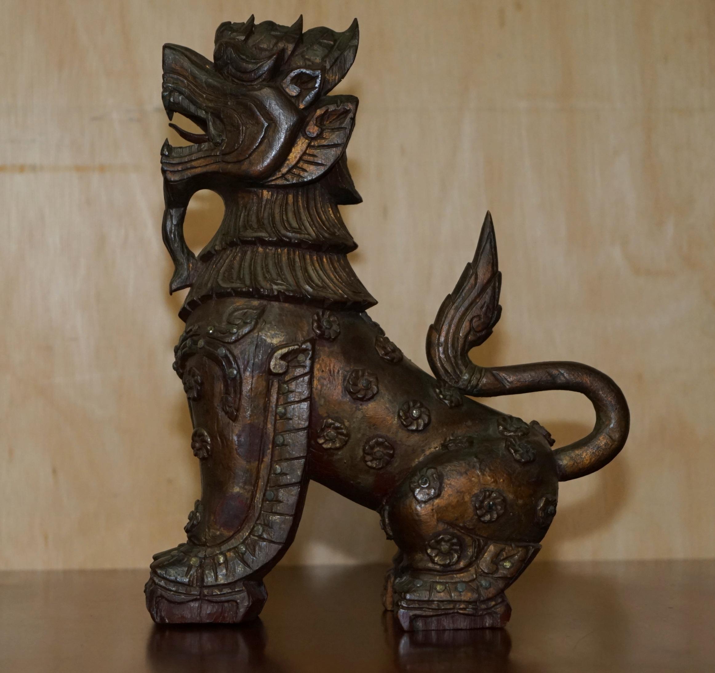 Royal House Antiques

Royal House Antiques is delighted to offer for sale this lovely, vintage hand carved Chinese Foo Lion Dog statue with original paint and patina

This is a very special and highly decorative piece, it really does give you a