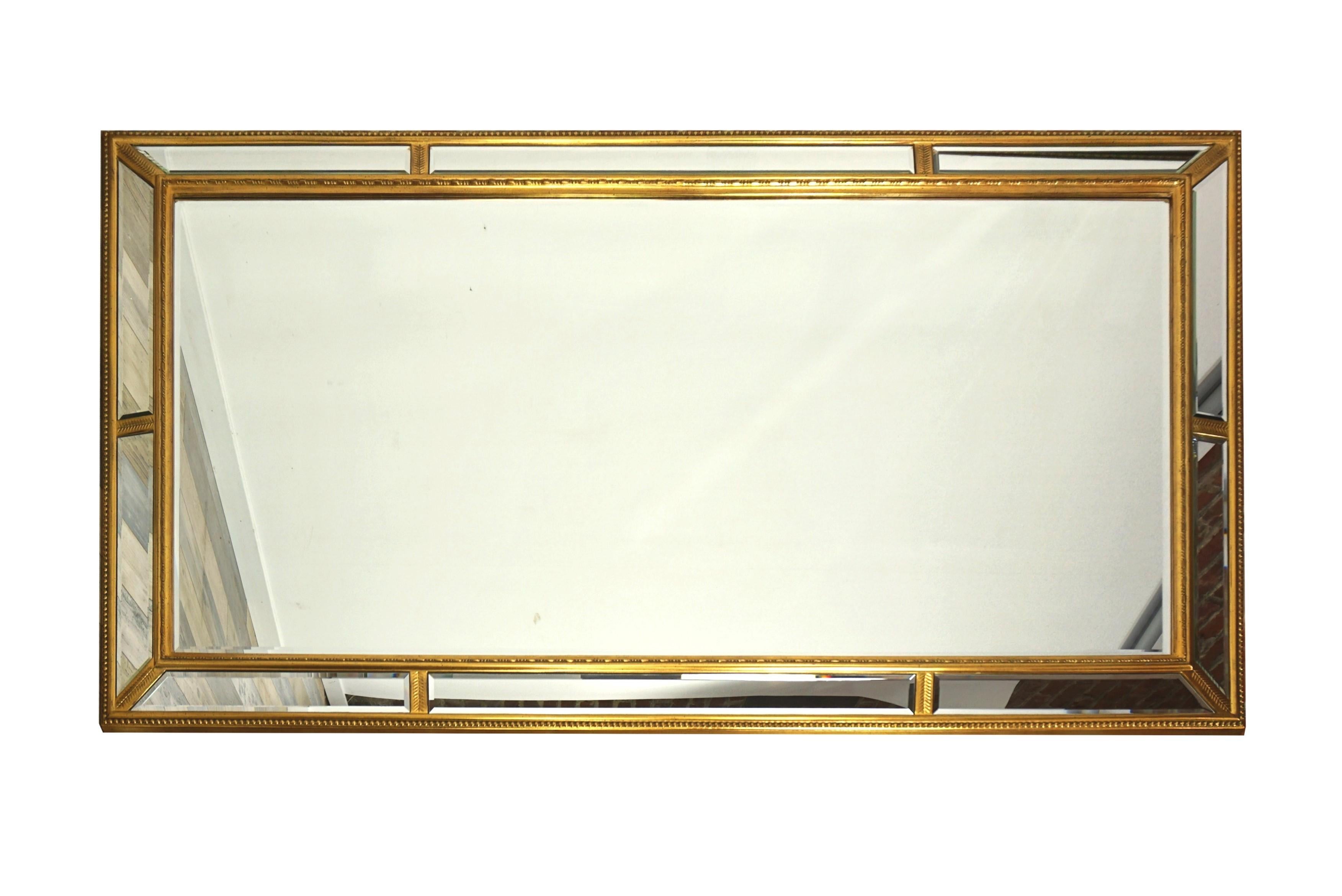 Large mirror with high-quality Deknudt fences. It imposes by its size but also by the quality of its manufacture. The built-in fasteners are designed so you can hang it in portrait or landscape. In perfect condition.