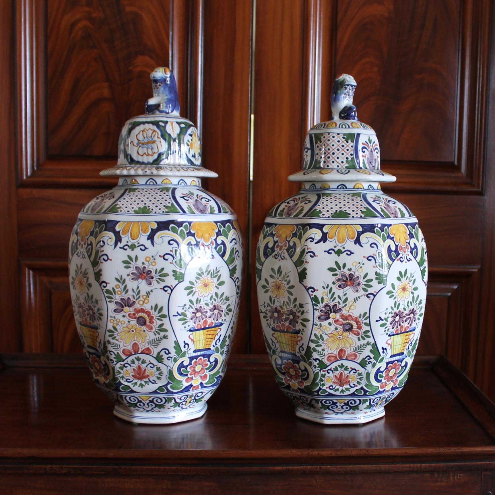 Dutch Large Delftware Polychrome Covered Jars With Lion Finials- a Pair For Sale