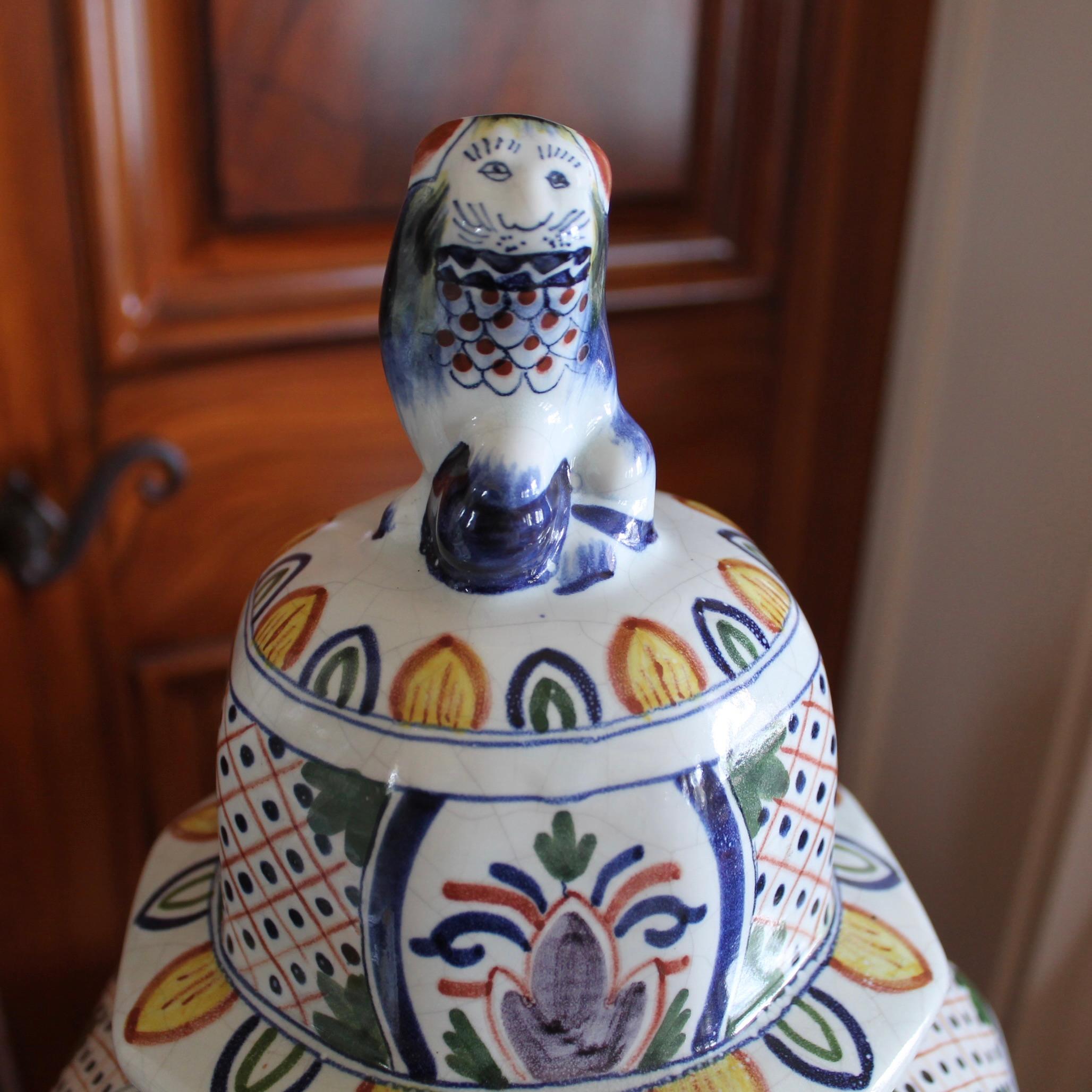 Ceramic Large Delftware Polychrome Covered Jars With Lion Finials- a Pair For Sale