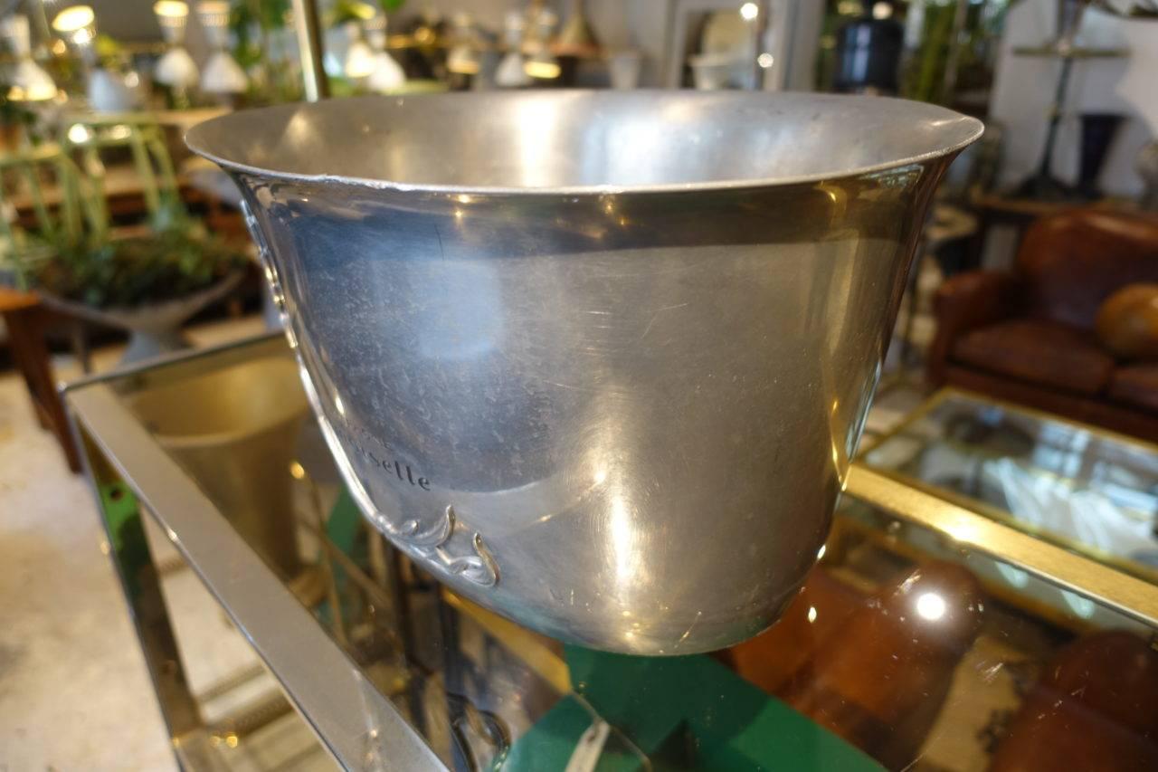 Exceptional and especially rare champagne / wine ice bucket. Provenance – hotel / restaurant in France. This one can hold five-six bottles, and is known by the text / label Champagne Demoiselle and its glorious Art Nouveau iris floral decoration.