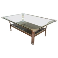 Grande table basse chromée avec étagères en verre