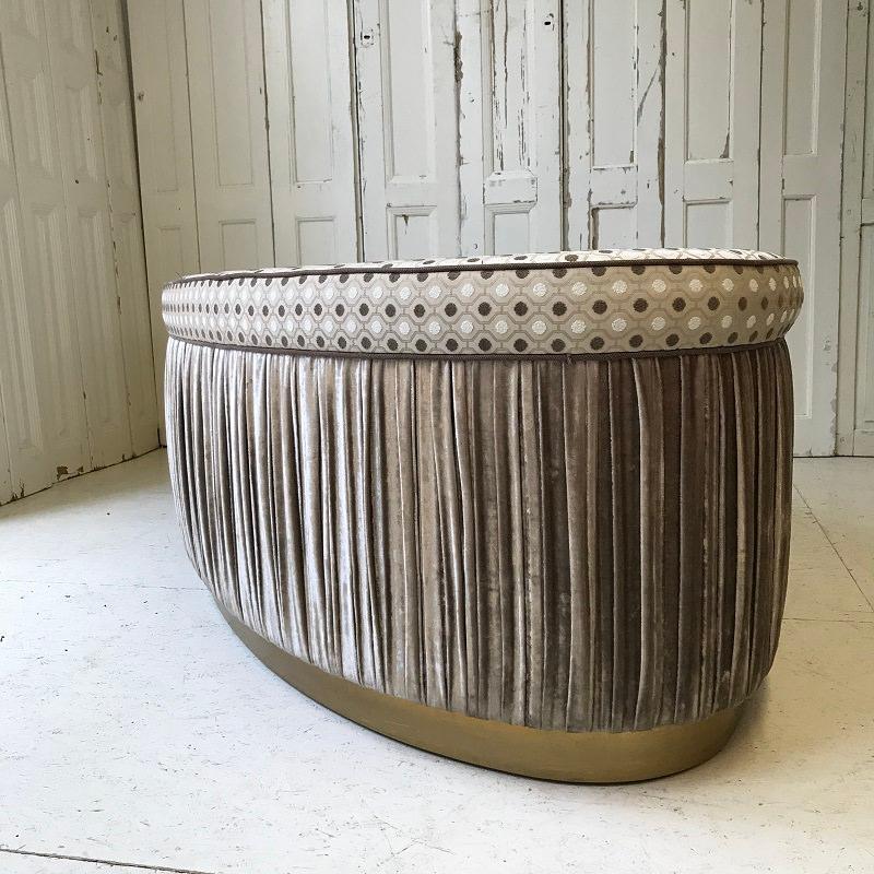 Beautiful hand-made Italian ottoman pouf. This very special piece is sturdy, comfortable and elegant adding a special seating offer to any room. With timeless fabric and gold trim truly an eye catcher!