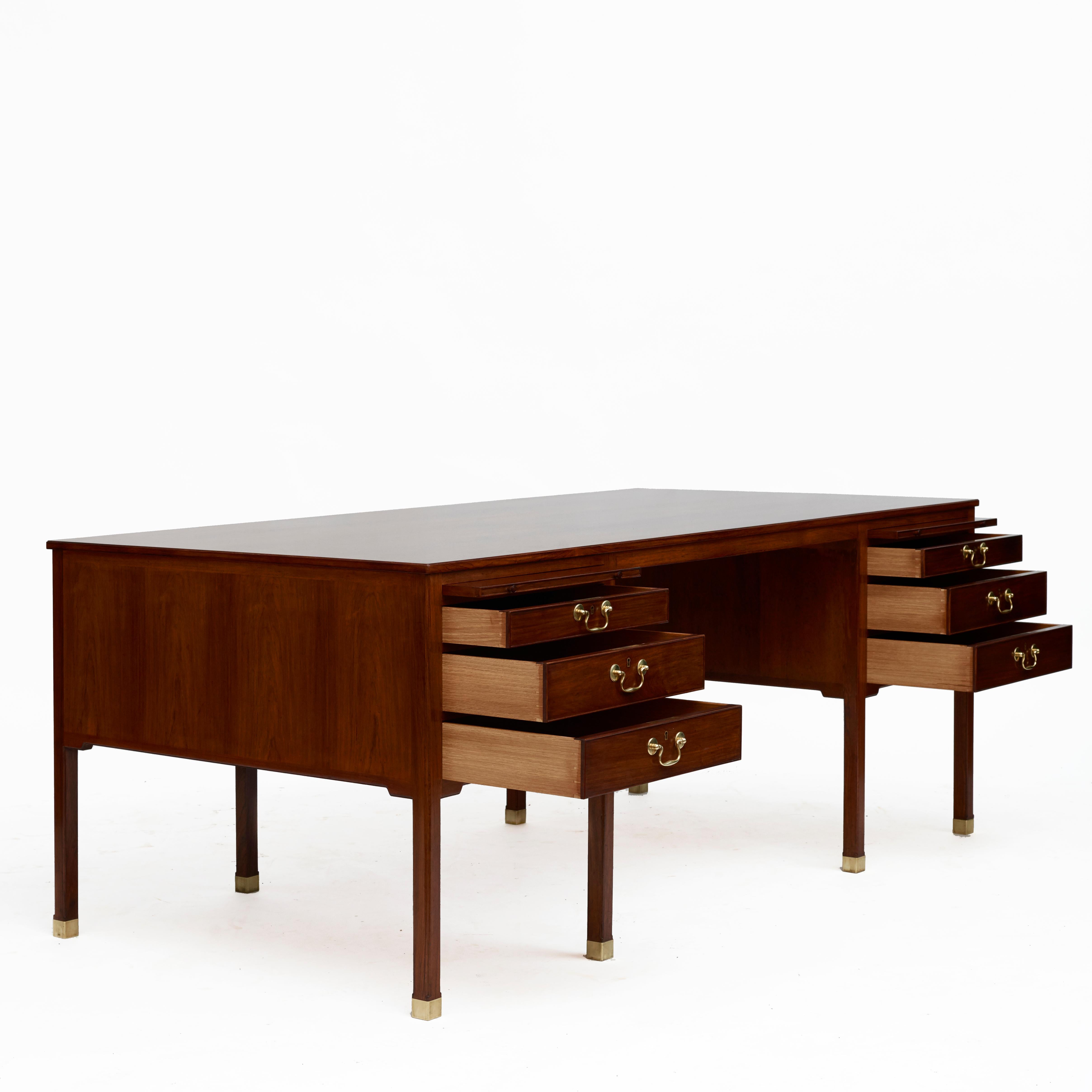 Jacob Kjær (1896-1957)
A rare one-of-a-kind freestanding Jacob Kjaer bureau-plat or desk.
Masterfully crafted in rosewood with original brass details.
Designed and executed in cabinetmaker Jacob Kjær's own furniture workshop, Denmark, circa
