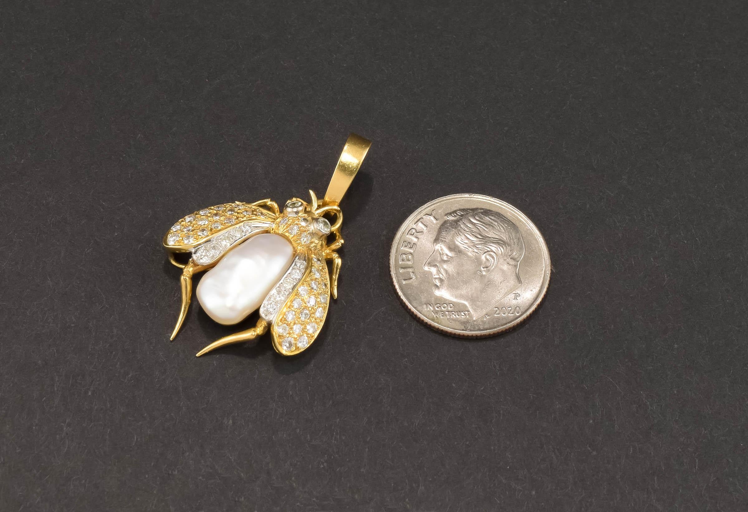 A fabulous and ultra sparkly gold and diamond Bee pendant with a great quality enhancer bail so you can add this Bee to nearly any chain or strand of pearls/gemstones.

Finely made of 14K gold, the Bee features 43 extremely fiery modern round